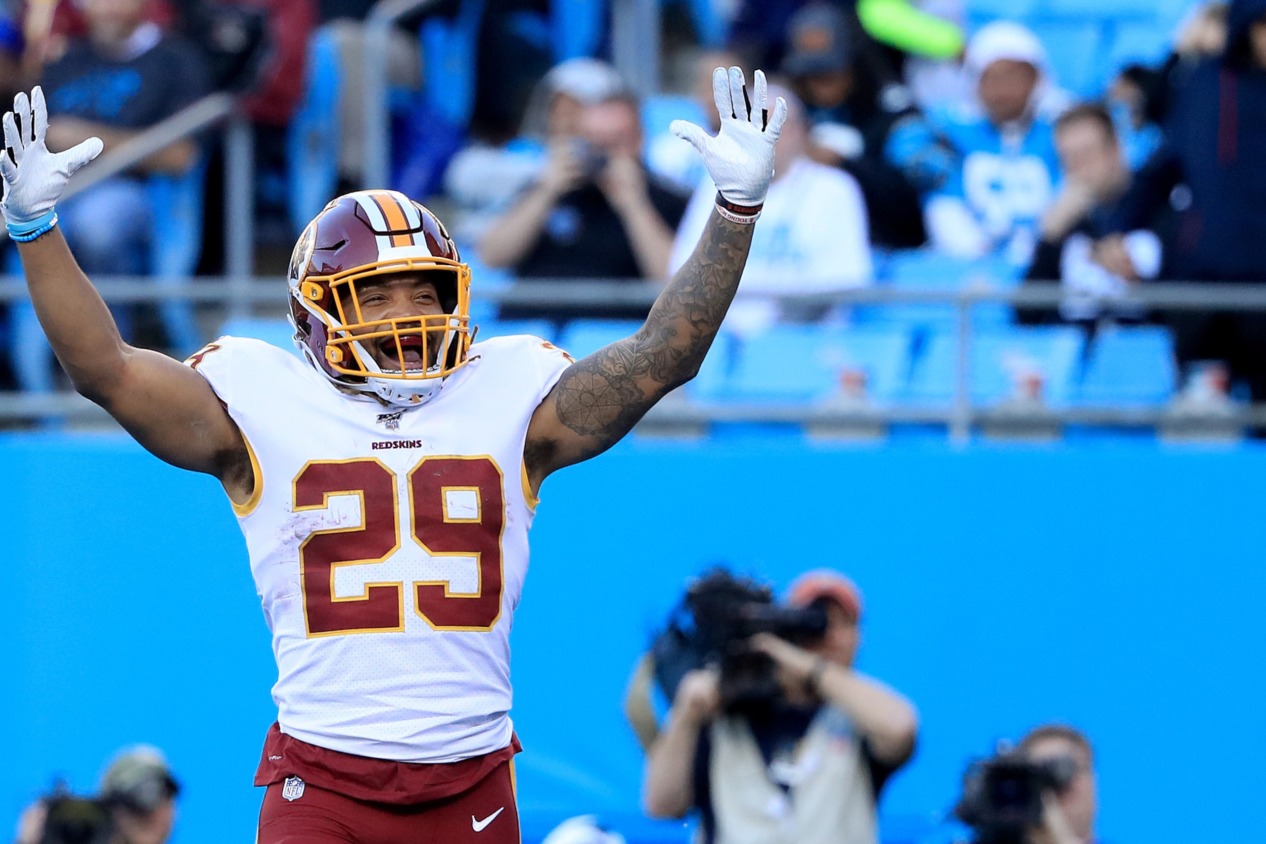 CHARLOTTE, NORTH CAROLINA - DECEMBER 01: Derrius Guice #29 of the Washington Redskins reacts after running for a touchdown against the Carolina Panthers during their game at Bank of America Stadium on December 01, 2019 in Charlotte, North Carolina. (Photo