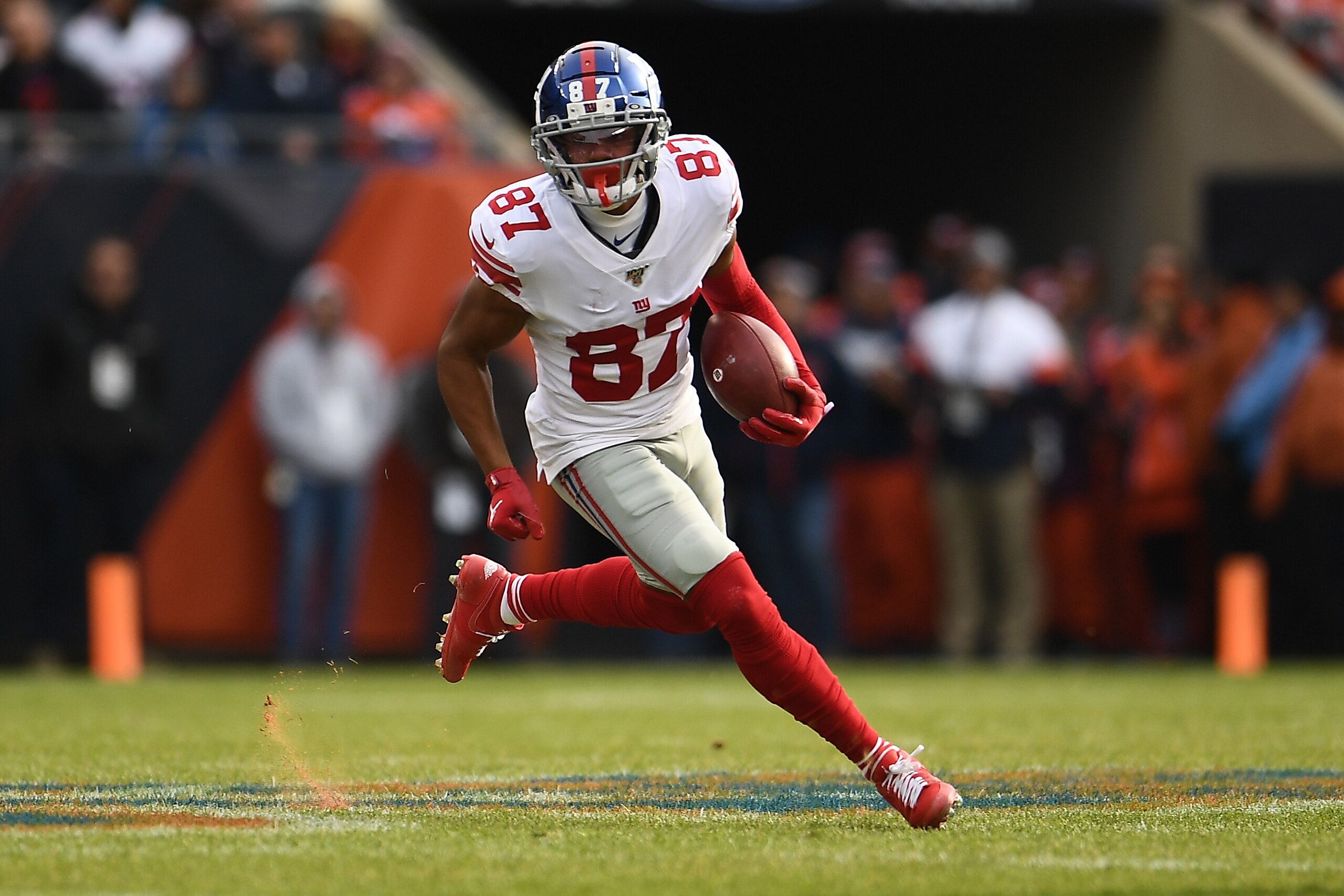 CHICAGO, ILLINOIS - NOVEMBER 24:  Sterling Shepard #87 of the New York Giants runs for yards during a game against the Chicago Bears at Soldier Field on November 24, 2019 in Chicago, Illinois.  The Bears defeated the Giants 19-14.  (Photo by Stacy Revere/