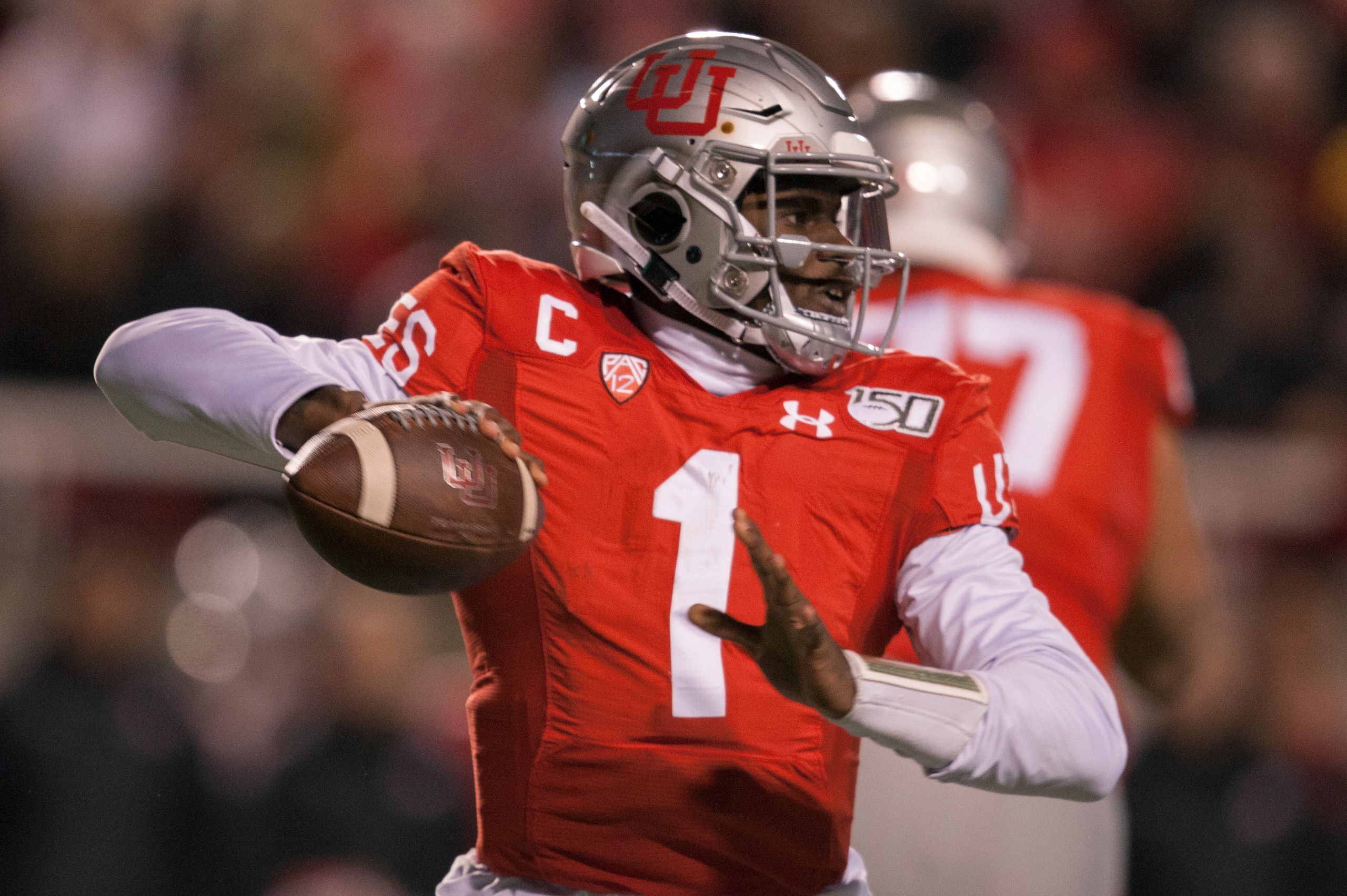 SALT LAKE CITY, UT - NOVEMBER 30: Tyler Huntley #1 of the Utah Utes sets to throw a pass against the Colorado Buffaloes during the first half at Rice-Eccles Stadium on November 30, 2019 in Salt Lake City, Utah. (Photo by Chris Gardner/Getty Images)