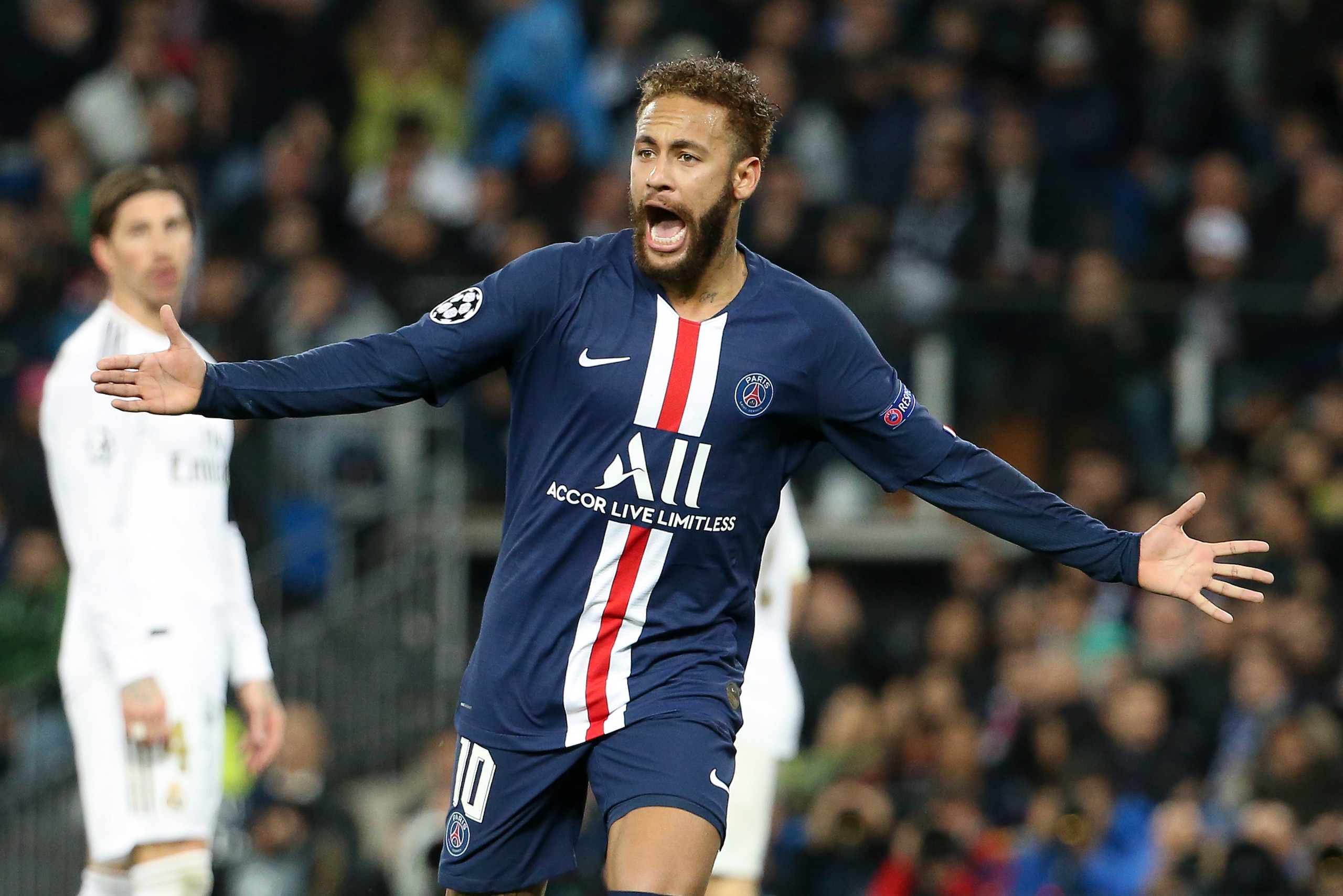 MADRID, SPAIN - NOVEMBER 26: Neymar Jr of PSG celebrates the goal of Pablo Sarabia of PSG tying the game during the UEFA Champions League group A match between Real Madrid and Paris Saint-Germain (PSG) at Santiago Bernabeu stadium on November 26, 2019 in 