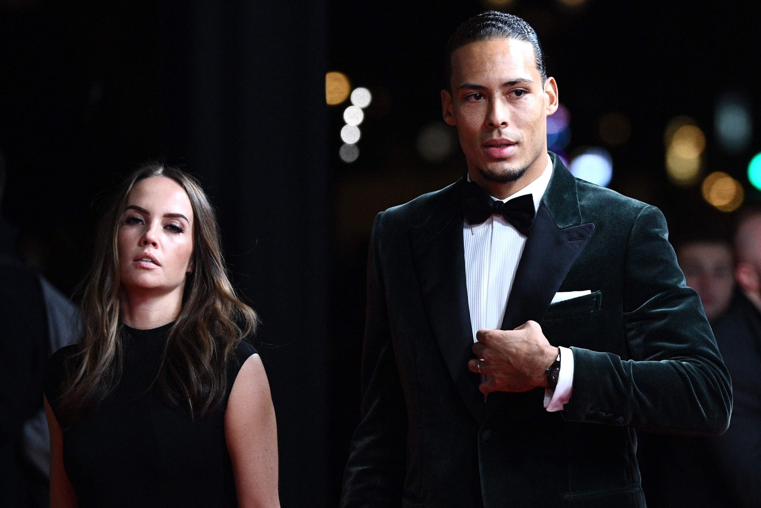 Liverpool's Dutch defender Virgil van Dijk and his wife Rike Nooitgedagt (L) arrive to attend the Ballon d'Or France Football 2019 ceremony at the Chatelet Theatre in Paris on December 2, 2019. (Photo by FRANCK FIFE / AFP) (Photo by FRANCK FIFE/AFP via Ge