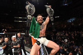 NEW YORK, NY - NOVEMBER 12:  UFC lightweight and featherweight champion Conor McGregor of Ireland celebrates after defeating Eddie Alvarez in their UFC lightweight championship fight during the UFC 205 event at Madison Square Garden on November 12, 2016 i