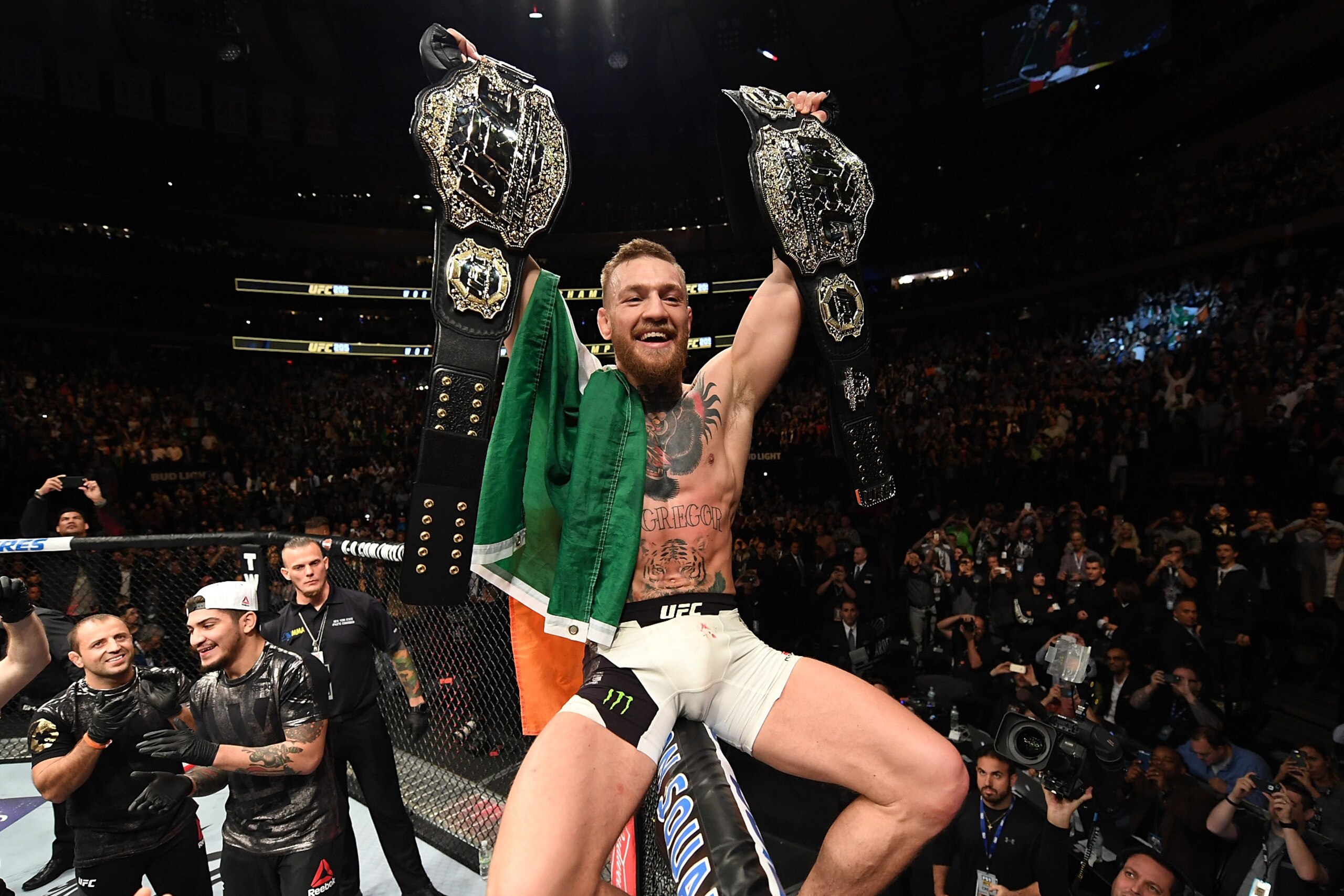 NEW YORK, NY - NOVEMBER 12:  UFC lightweight and featherweight champion Conor McGregor of Ireland celebrates after defeating Eddie Alvarez in their UFC lightweight championship fight during the UFC 205 event at Madison Square Garden on November 12, 2016 i
