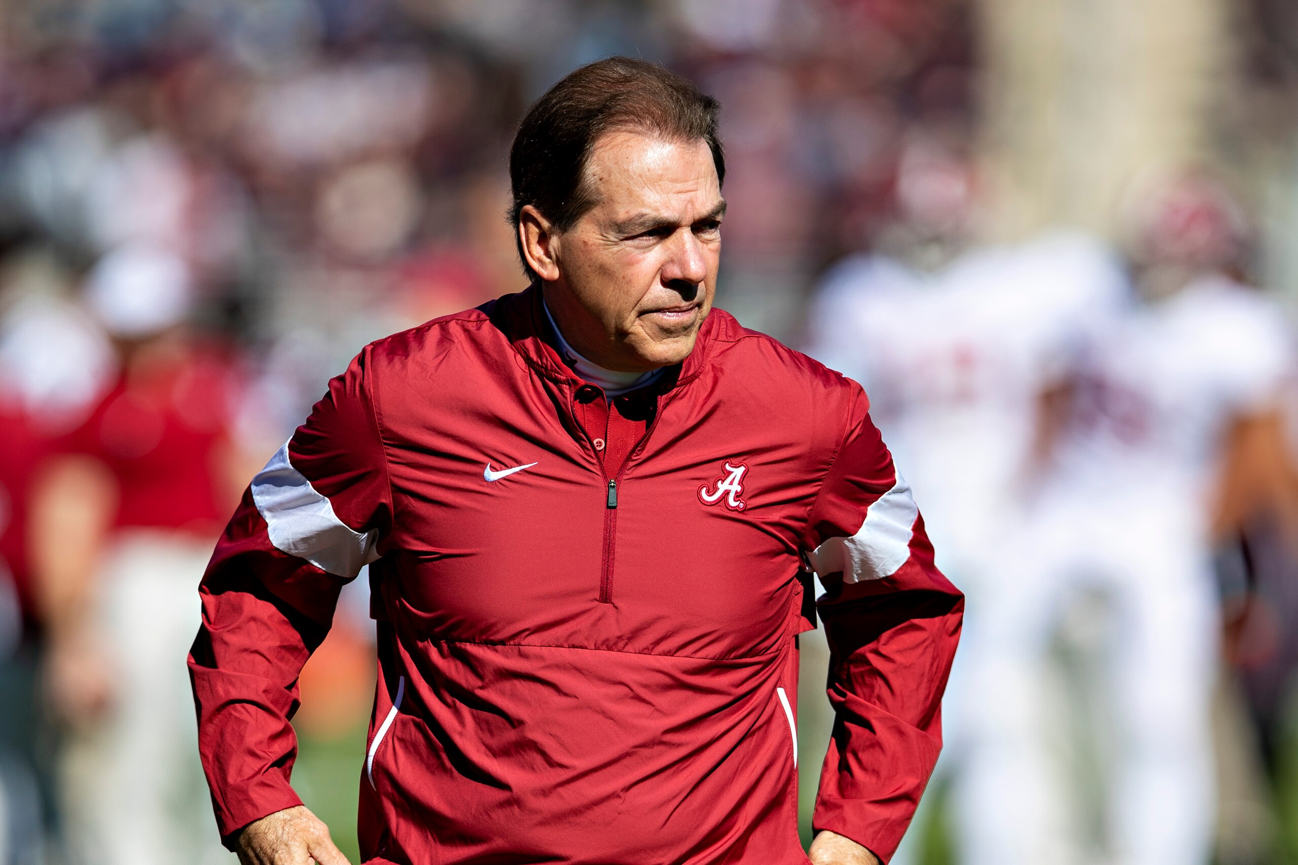FAYETTEVILLE, AR - NOVEMBER 9:   Head Coach Nick Saban of the Alabama Crimson Tide on the field watching his team warm up before a game against the Mississippi State Bulldogs at Davis Wade Stadium on November 16, 2019 in Starkville, Mississippi.  The Crim