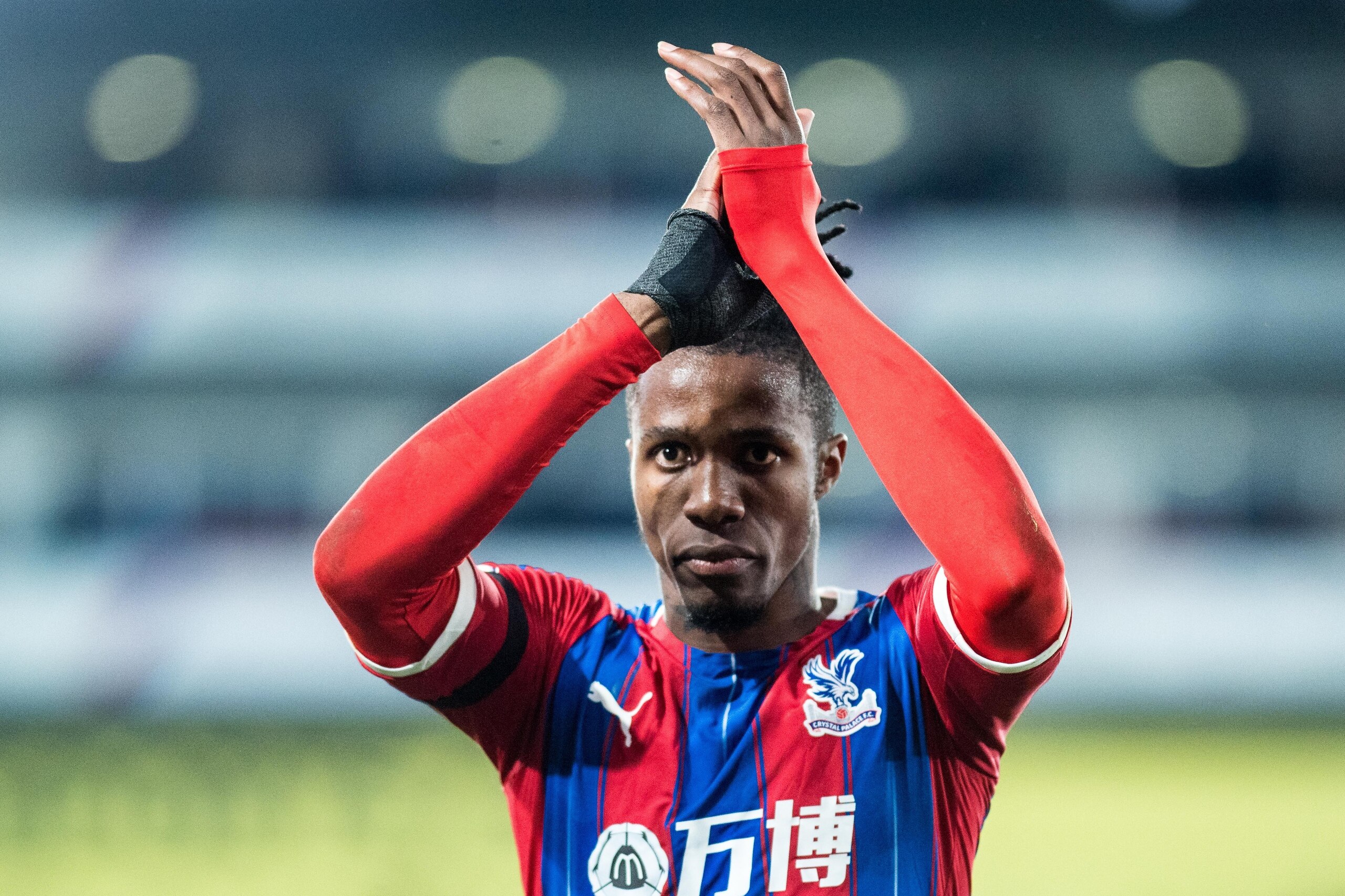 LONDON, ENGLAND - DECEMBER 03: Wilfried Zaha of Crystal Palace gestures during the Premier League match between Crystal Palace and AFC Bournemouth  at Selhurst Park on December 3, 2019 in London, United Kingdom. (Photo by Sebastian Frej/MB Media/Getty Ima