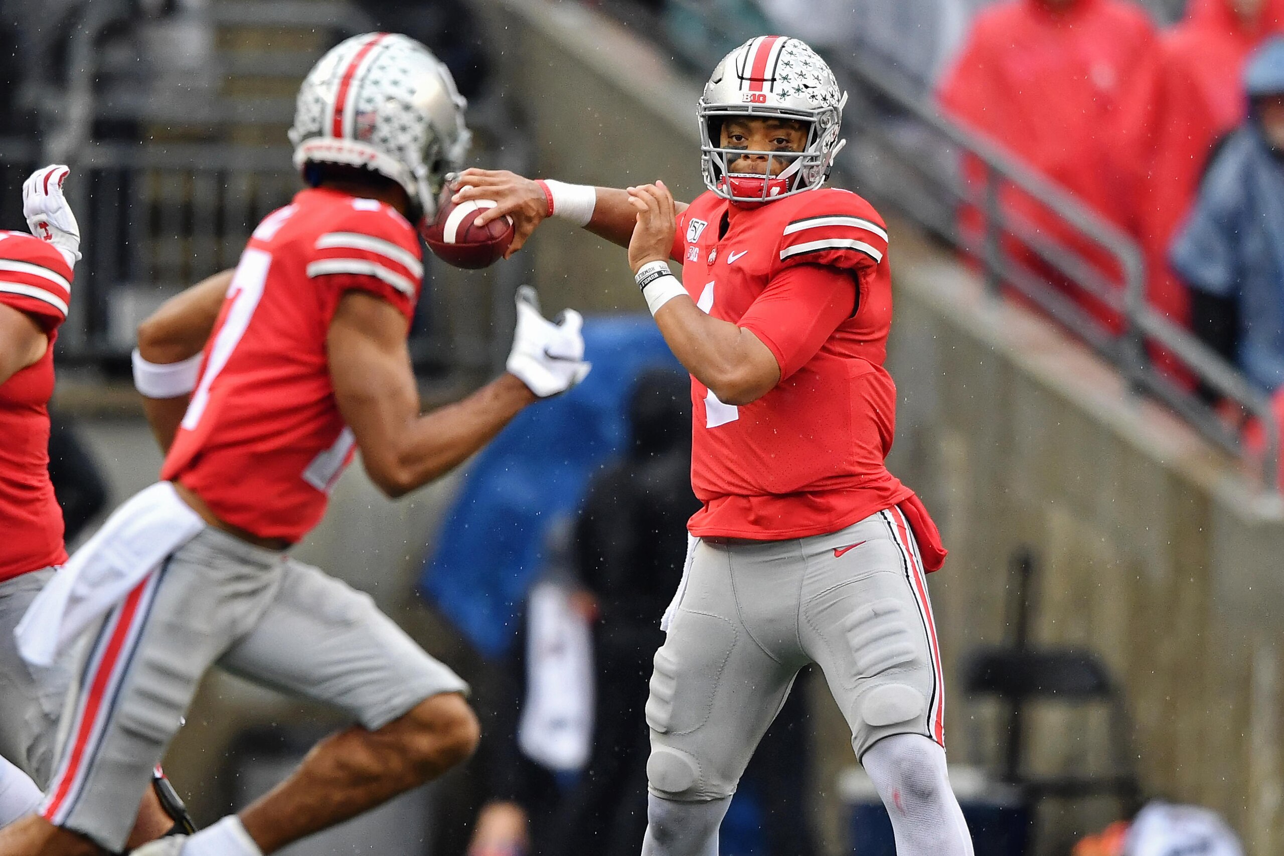 COLUMBUS, OH - OCTOBER 26:  Quarterback Justin Fields #1 of the Ohio State Buckeyes throws against the Wisconsin Badgers at Ohio Stadium on October 26, 2019 in Columbus, Ohio.  (Photo by Jamie Sabau/Getty Images)