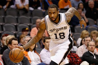 PHOENIX, AZ - JANUARY 21:  Rasual Butler #18 of the San Antonio Spurs handles the ball during the NBA game against the Phoenix Suns at Talking Stick Resort Arena on January 21, 2016 in Phoenix, Arizona.  The Spurs defeated the Suns 117-89.  NOTE TO USER: 