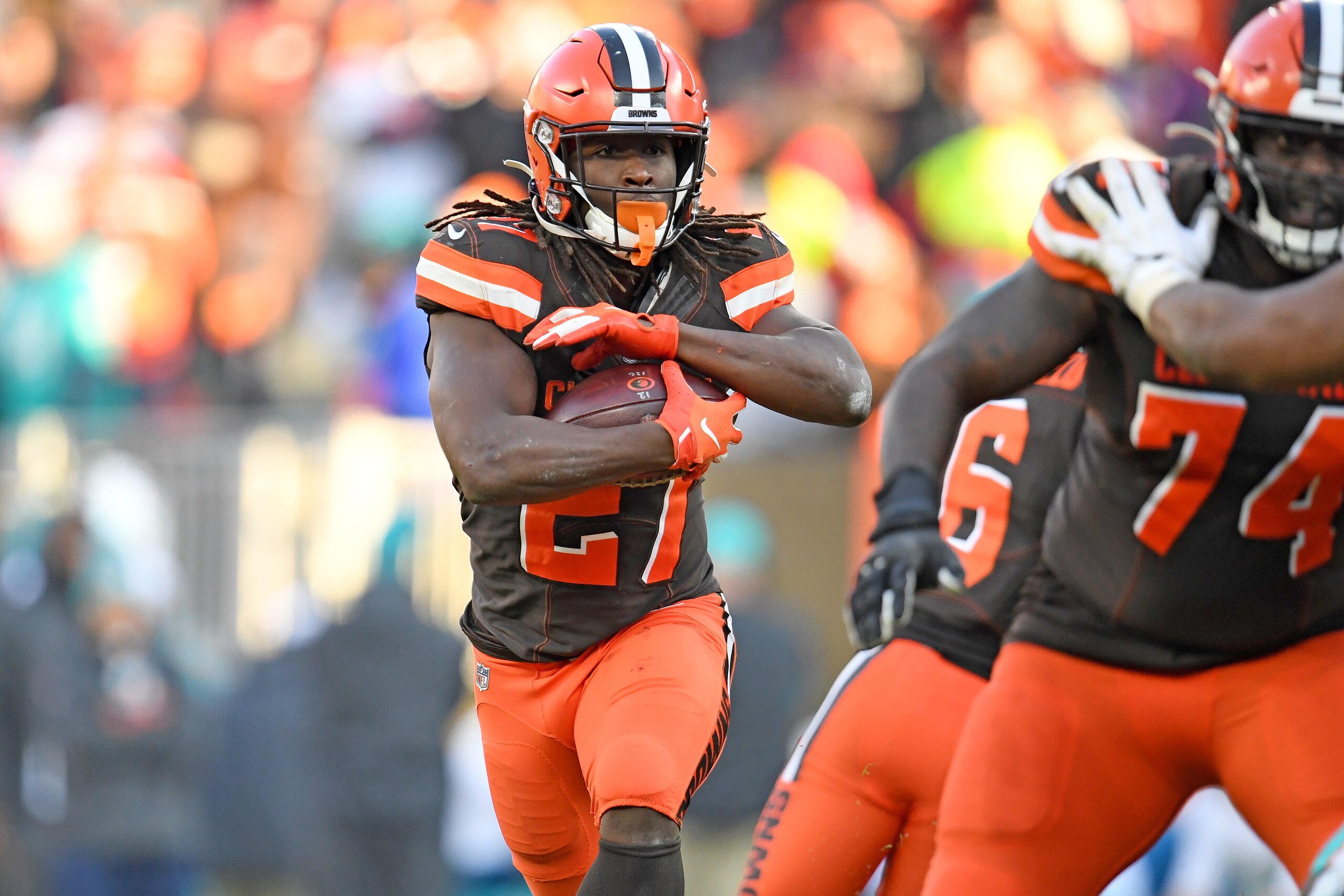 CLEVELAND, OHIO - NOVEMBER 24: Running back Kareem Hunt #27 of the Cleveland Browns runs for a gain during the second half against the Miami Dolphins at FirstEnergy Stadium on November 24, 2019 in Cleveland, Ohio. The Browns defeated the Dolphins 41-24. (