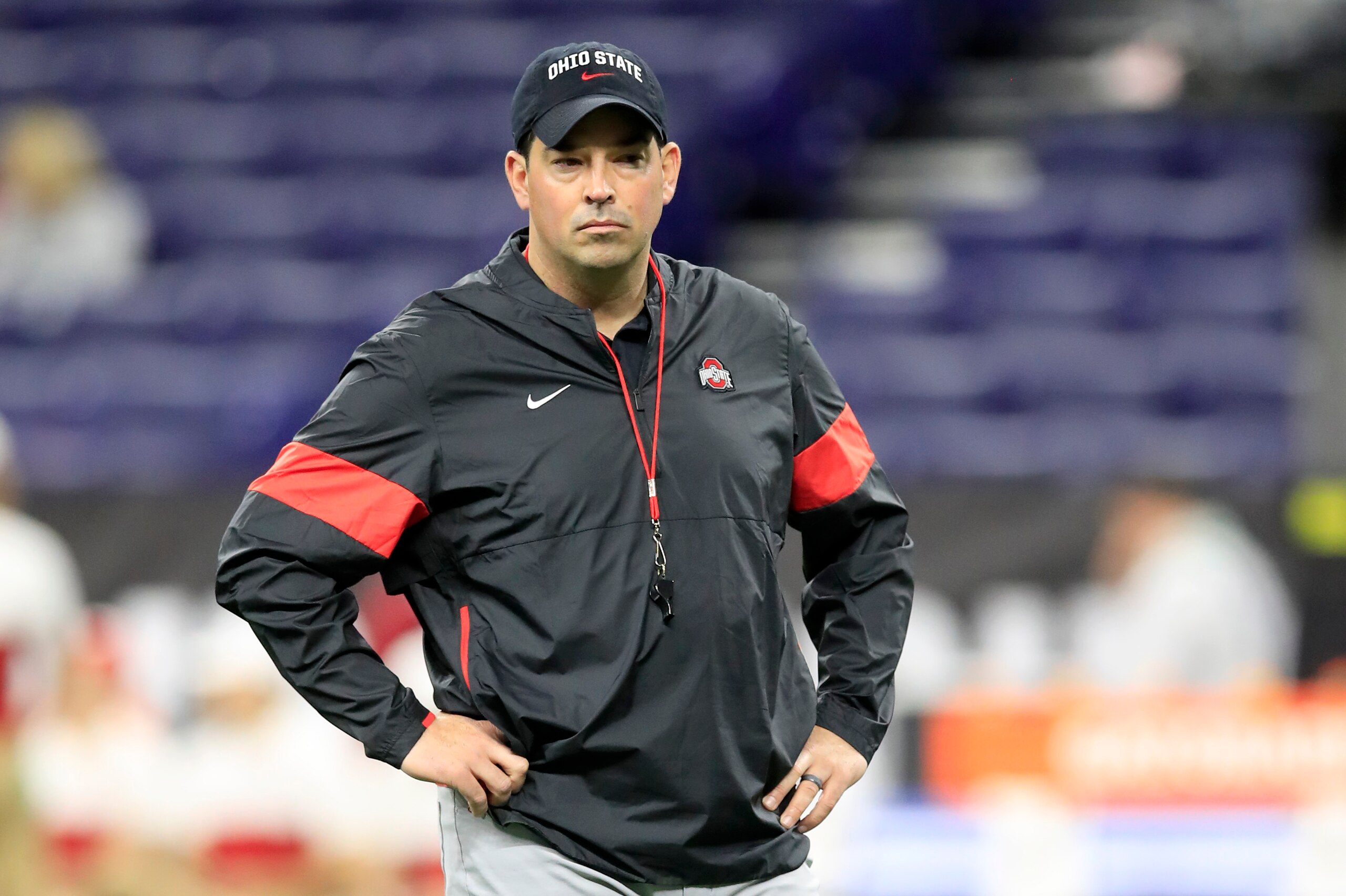 INDIANAPOLIS, INDIANA - DECEMBER 07: Ryan Day the head coach of the Ohio State Buckeyes watches his team practice before the start of the BIG Ten Football Championship game against the Wisconsin Badgers at Lucas Oil Stadium on December 07, 2019 in Indiana