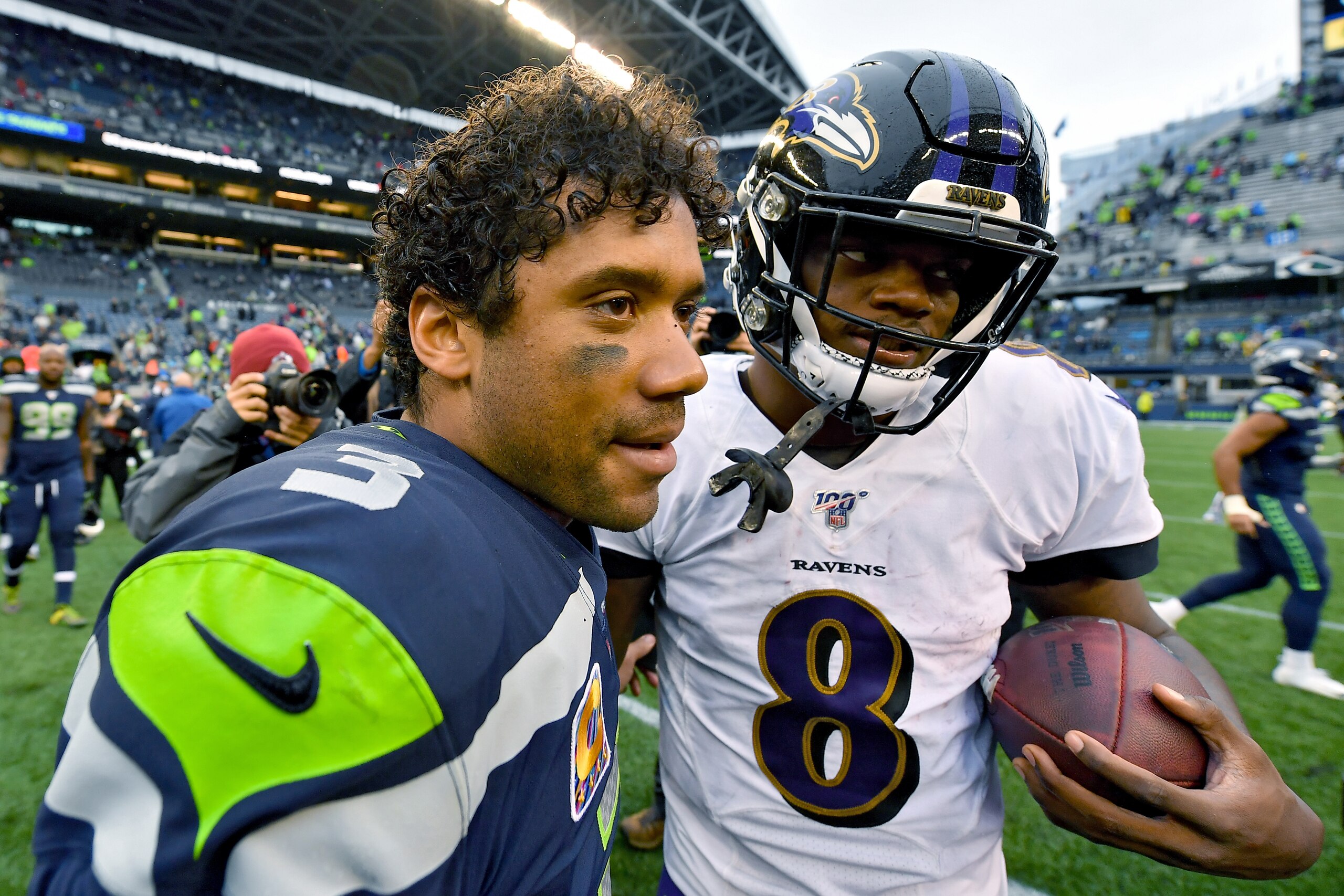 SEATTLE, WASHINGTON - OCTOBER 20: Russell Wilson #3 of the Seattle Seahawks and Lamar Jackson #8 of the Baltimore Ravens hug after the game at CenturyLink Field on October 20, 2019 in Seattle, Washington. The Baltimore Ravens top the Seattle Seahawks 30-1 SEATTLE, WASHINGTON - OCTOBER 20: Russell Wilson #3 of the Seattle Seahawks and Lamar Jackson #8 of the Baltimore Ravens hug after the game at CenturyLink Field on October 20, 2019 in Seattle, Washington. The Baltimore Ravens top the Seattle Seahawks 30-1