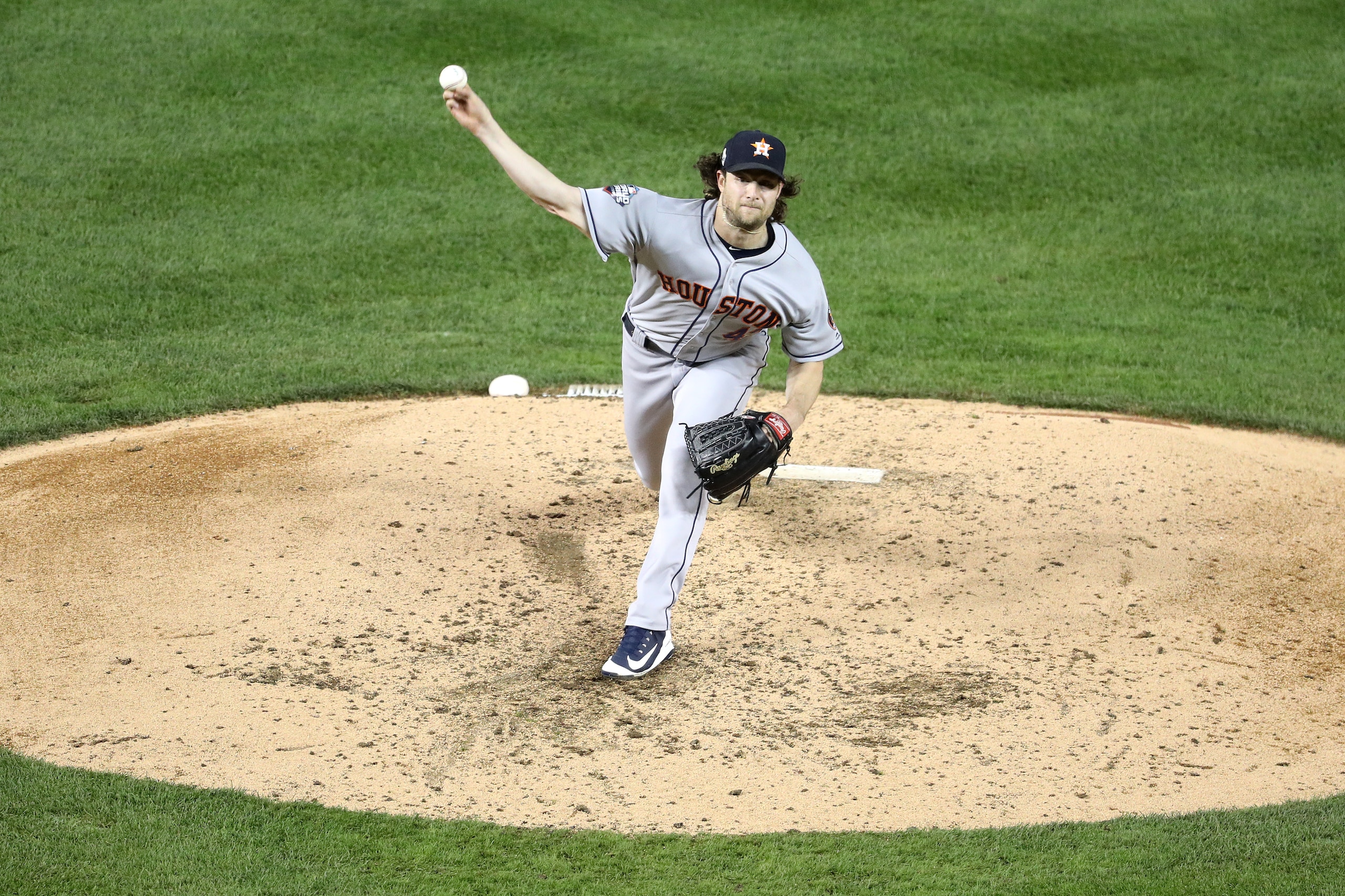 WASHINGTON, DC - OCTOBER 27:  Gerrit Cole #45 of the Houston Astros delivers the pitch against the Washington Nationals during the fourth inning in Game Five of the 2019 World Series at Nationals Park on October 27, 2019 in Washington, DC. (Photo by Will 