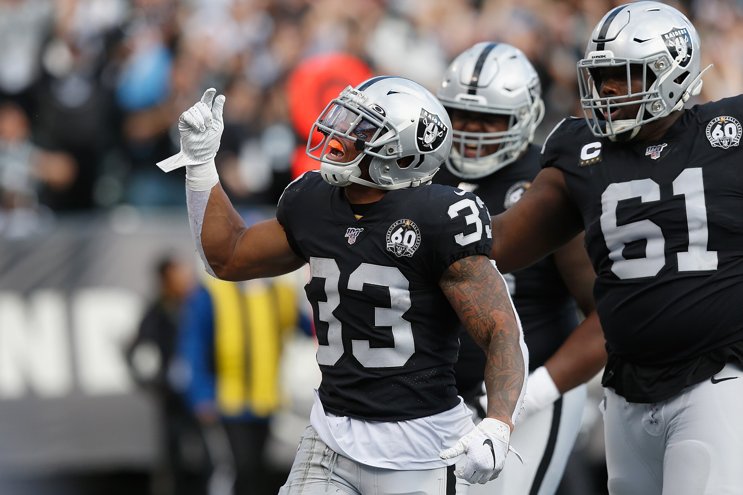 OAKLAND, CALIFORNIA - DECEMBER 08: DeAndre Washington #33 of the Oakland Raiders celebrates after scoring a touchdown in the first quarter against the Tennessee Titans at RingCentral Coliseum on December 08, 2019 in Oakland, California. (Photo by Lachlan OAKLAND, CALIFORNIA - DECEMBER 08: DeAndre Washington #33 of the Oakland Raiders celebrates after scoring a touchdown in the first quarter against the Tennessee Titans at RingCentral Coliseum on December 08, 2019 in Oakland, California. (Photo by Lachlan