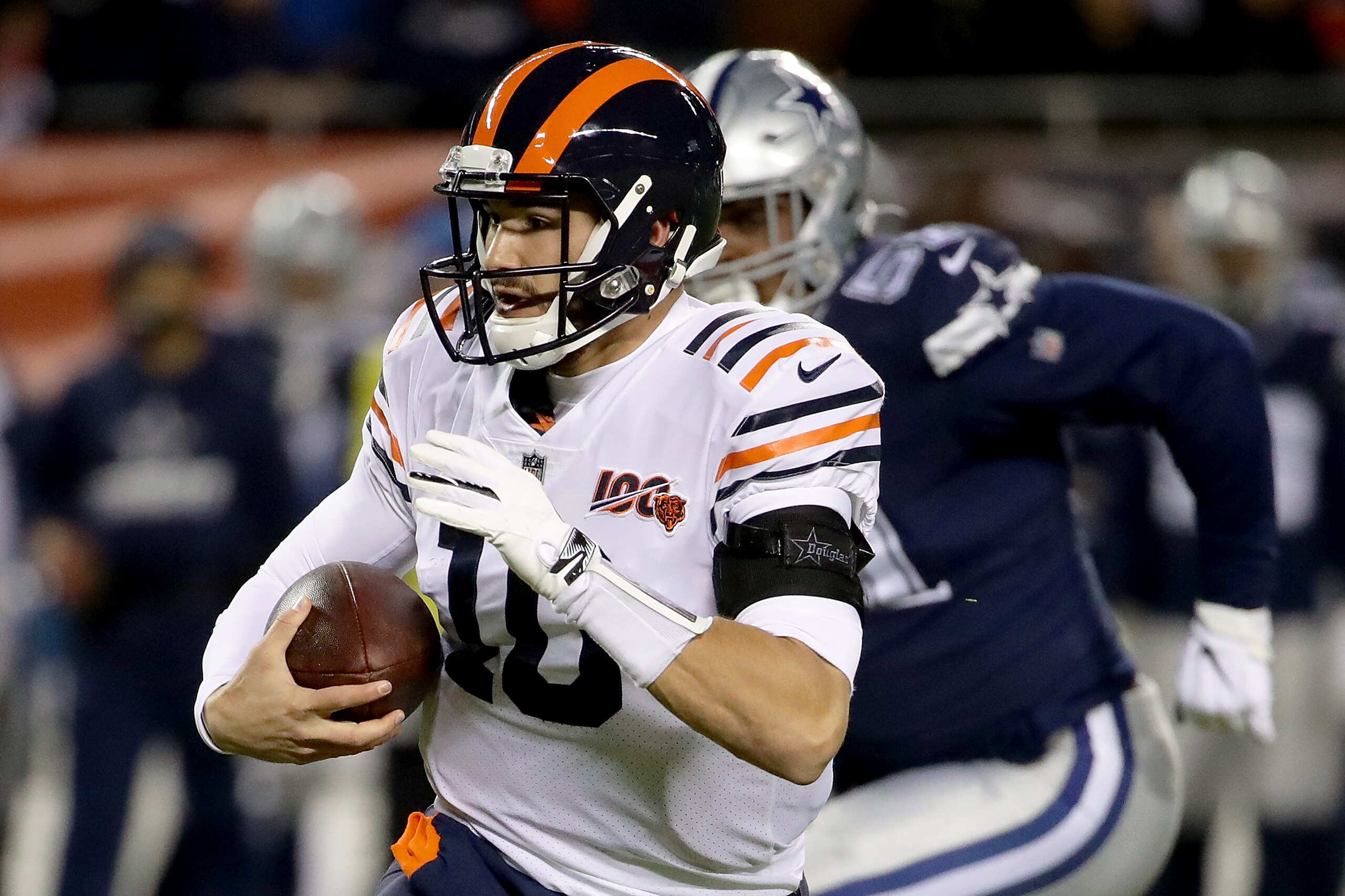 CHICAGO, ILLINOIS - DECEMBER 05: Quarterback Mitchell Trubisky #10 of the Chicago Bears runs against the defense of defensive end Kerry Hyder #51 of the Dallas Cowboys during the game at Soldier Field on December 05, 2019 in Chicago, Illinois. (Photo by J CHICAGO, ILLINOIS - DECEMBER 05: Quarterback Mitchell Trubisky #10 of the Chicago Bears runs against the defense of defensive end Kerry Hyder #51 of the Dallas Cowboys during the game at Soldier Field on December 05, 2019 in Chicago, Illinois. (Photo by J