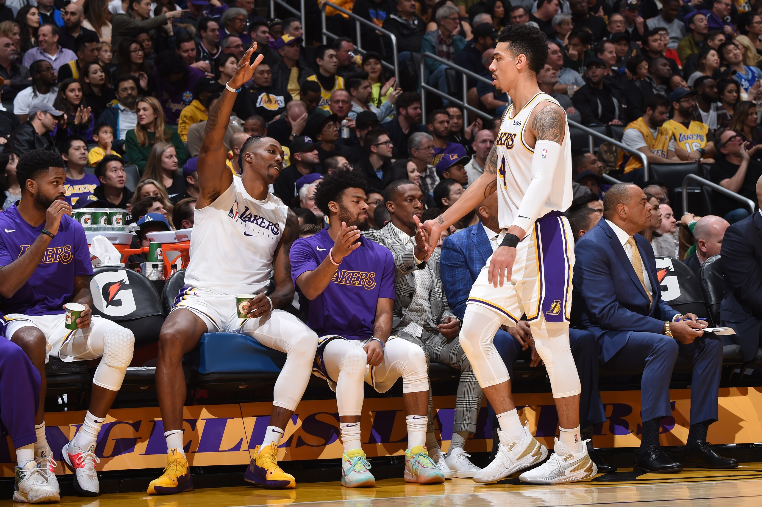 LOS ANGELES, CA - DECEMBER 8: Danny Green #14 of the Los Angeles Lakers high fives his teammates during the game against the Minnesota Timberwolves on December 8, 2019 at STAPLES Center in Los Angeles, California. NOTE TO USER: User expressly acknowledges