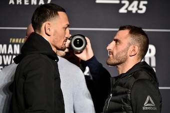 LAS VEGAS, NEVADA - DECEMBER 12:  (L-R) Max Holloway and Alexander Volkanovski of Australia face off during the UFC 245 Ultimate Media Day at the Red Rock Casino Resort on December 12, 2019 in Las Vegas, Nevada. (Photo by Chris Unger/Zuffa LLC via Getty I