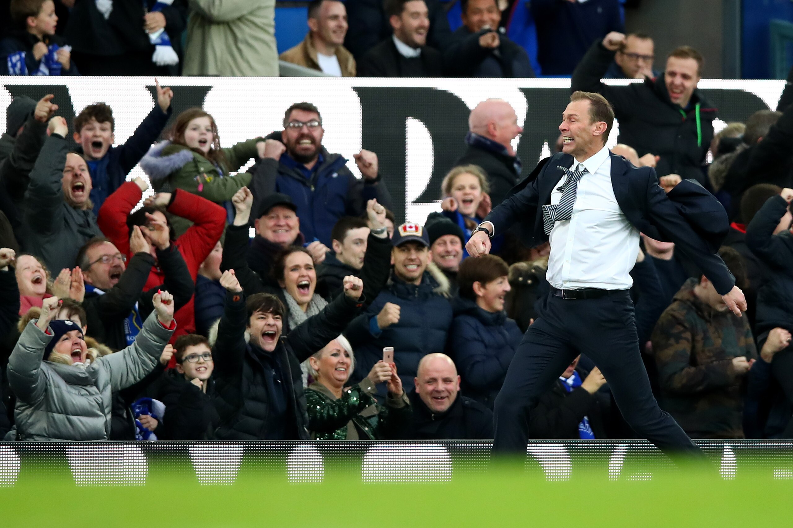 LIVERPOOL, ENGLAND - DECEMBER 07: Interim Everton Manager, Duncan Ferguson celebrates his team's third goal with the crowd during the Premier League match between Everton FC and Chelsea FC at Goodison Park on December 07, 2019 in Liverpool, United Kingdom