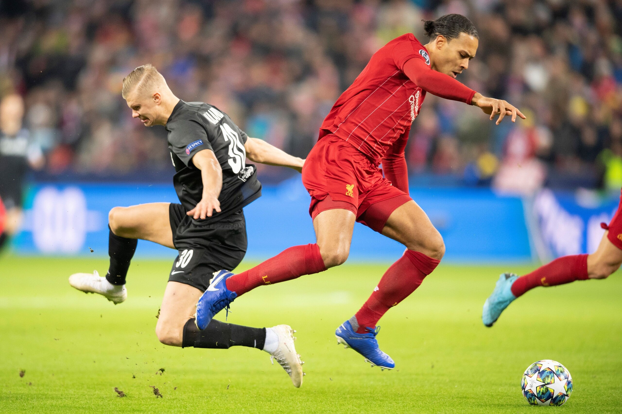 Salzburg's Norwegian forward Erling Haaland (L) and Liverpool's Dutch defender Virgil Van Dilk vie for the ball during the UEFA Champions League Group E football match between RB Salzburg and Liverpool FC on December 10, 2019 in Salzburg, Austria. (Photo Salzburg's Norwegian forward Erling Haaland (L) and Liverpool's Dutch defender Virgil Van Dilk vie for the ball during the UEFA Champions League Group E football match between RB Salzburg and Liverpool FC on December 10, 2019 in Salzburg, Austria. (Photo
