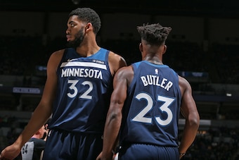 MINNEAPOLIS, MN - OCTOBER 19: Karl-Anthony Towns #32 and Jimmy Butler #23 of the Minnesota Timberwolves run up the court against the Cleveland Cavaliers on October 19, 2018 at Target Center in Minneapolis, Minnesota. NOTE TO USER: User expressly acknowled
