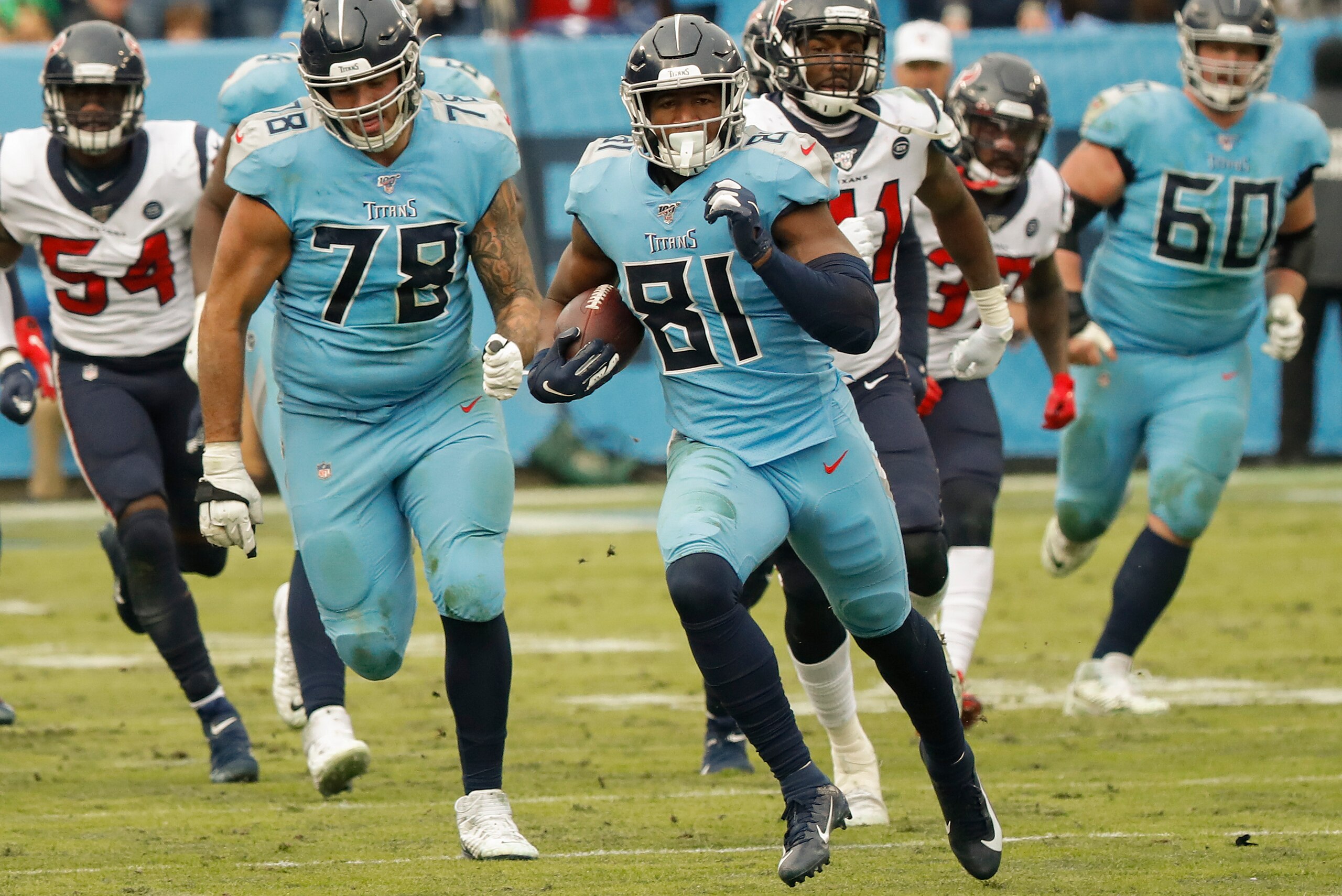 NASHVILLE, TENNESSEE - DECEMBER 15: Tight end Jonnu Smith #81 of the Tennessee Titans rushes for 57 yards, the longest rush by a tight end in 47 years, during the second half at Nissan Stadium on December 15, 2019 in Nashville, Tennessee. (Photo by Freder