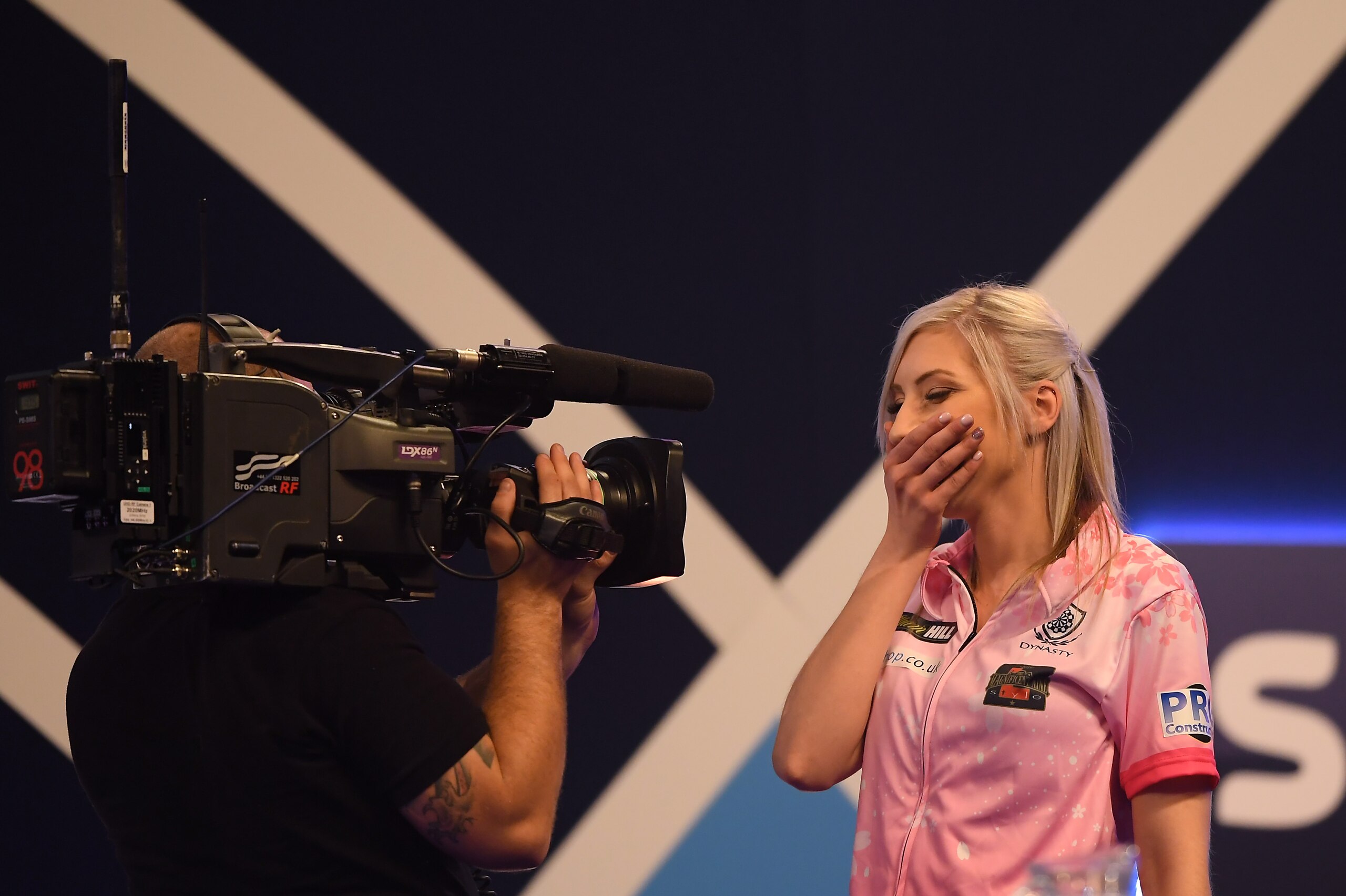 LONDON, ENGLAND - DECEMBER 17:  Fallon Sherrock reacts after winning her 1st round game against Ted Evetts to become the first female to win a game in the PDC World Championships during Day 5 of the 2020 William Hill Darts Championship  at Alexandra Palac