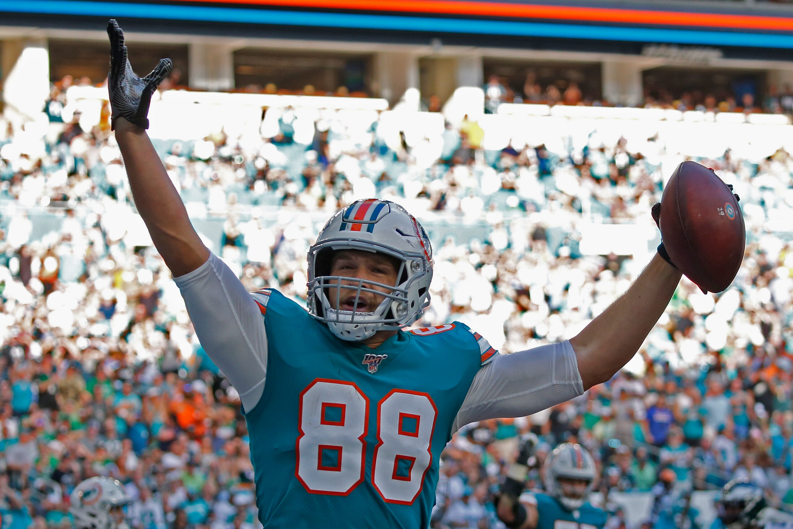 MIAMI GARDENS, FL - DECEMBER 1: Mike Gesicki #88 of the Miami Dolphins celebrates after scoring a touchdown against the Philadelphia Eagles during an NFL game on December 1, 2019 at Hard Rock Stadium in Miami Gardens, Florida. The Dolphins defeated the Ea