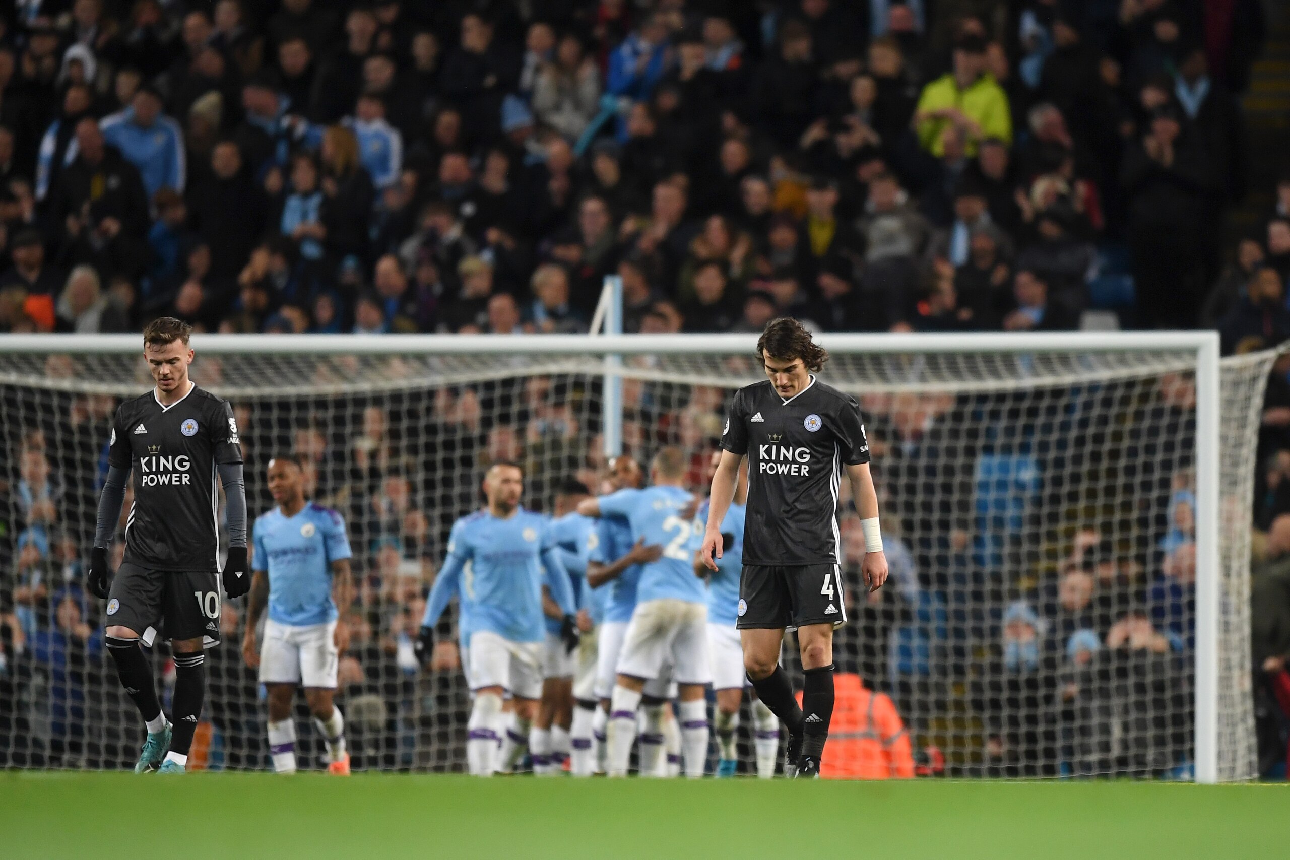 MANCHESTER, ENGLAND - DECEMBER 21: Caglar Soyuncu of Leicester City looks dejected following Manchester City's third goal during the Premier League match between Manchester City and Leicester City at Etihad Stadium on December 21, 2019 in Manchester, Unit