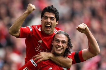 LONDON, ENGLAND - APRIL 14:  Andy Carroll of Liverpool celebrates with Luis Suarez as he scores their second goal during the FA Cup with Budweiser Semi Final match between Liverpool and Everton at Wembley Stadium on April 14, 2012 in London, England.  (Ph