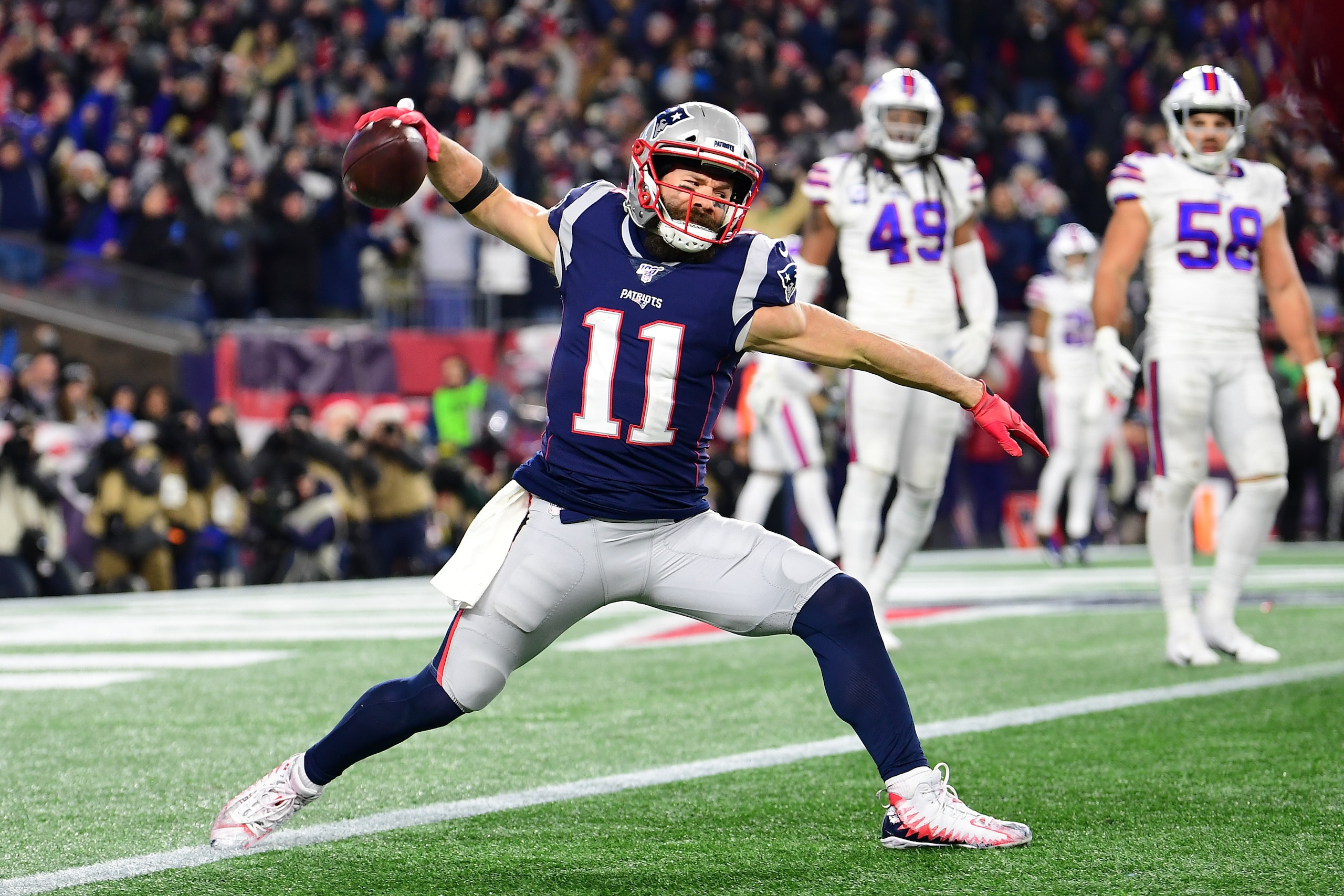 FOXBOROUGH, MASSACHUSETTS - DECEMBER 21: Julian Edelman #11 of the New England Patriots celebrates after catching a pass for a two point conversion during the fourth quarter against the Buffalo Bills in the game at Gillette Stadium on December 21, 2019 in FOXBOROUGH, MASSACHUSETTS - DECEMBER 21: Julian Edelman #11 of the New England Patriots celebrates after catching a pass for a two point conversion during the fourth quarter against the Buffalo Bills in the game at Gillette Stadium on December 21, 2019 in