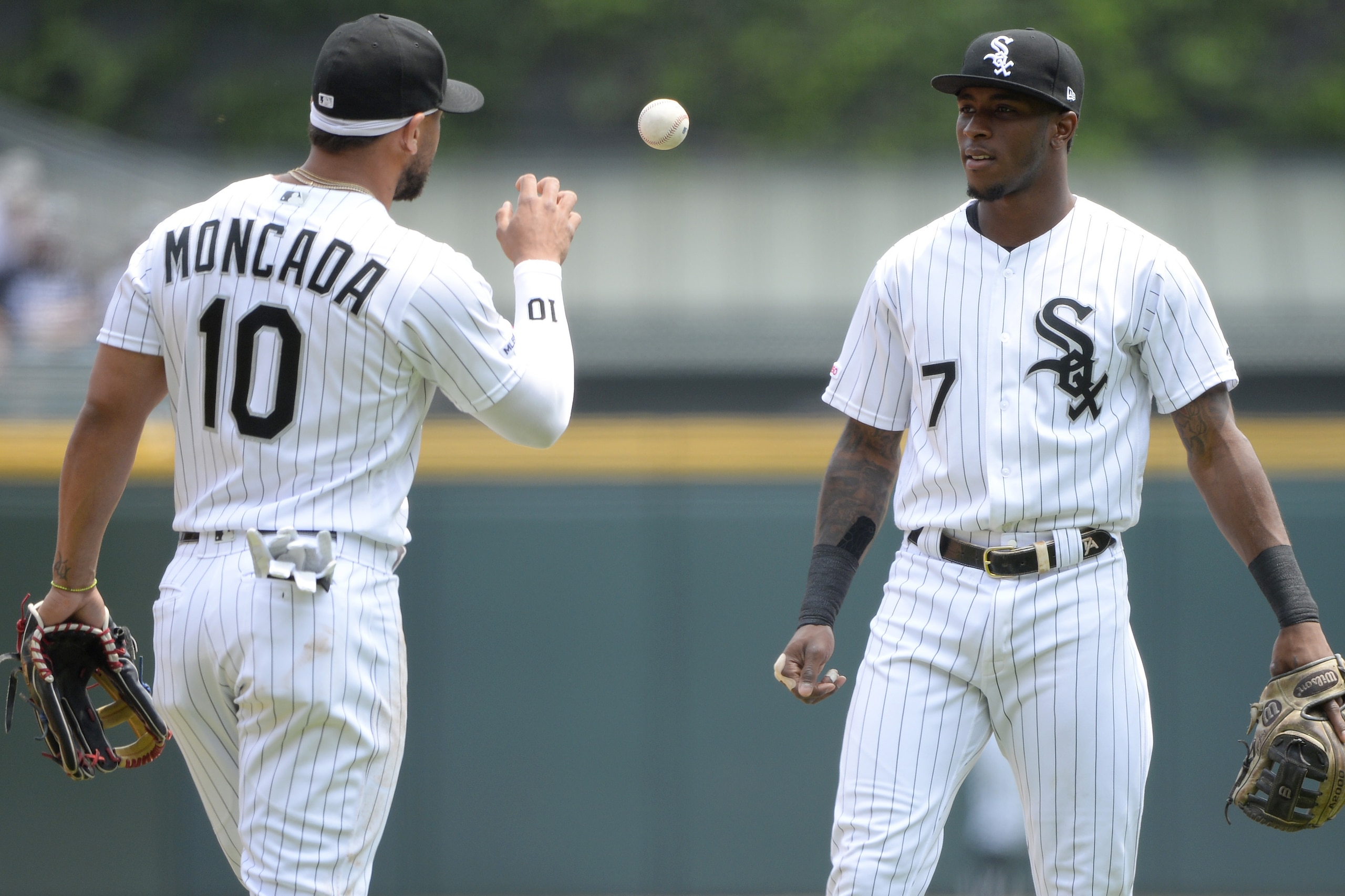 CHICAGO - JUNE 01: Tim Anderson #7 tosses the baseball to Yoan Moncada #10 of the Chicago White Sox during the game against the Cleveland Indians on June 1, 2019 at Guaranteed Rate Field in Chicago, Illinois. (Photo by Ron Vesely/MLB Photos via Getty Im CHICAGO - JUNE 01: Tim Anderson #7 tosses the baseball to Yoan Moncada #10 of the Chicago White Sox during the game against the Cleveland Indians on June 1, 2019 at Guaranteed Rate Field in Chicago, Illinois. (Photo by Ron Vesely/MLB Photos via Getty Im