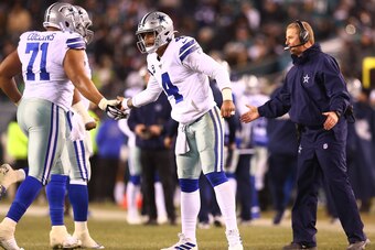 PHILADELPHIA, PENNSYLVANIA - DECEMBER 22: Dak Prescott #4 of the Dallas Cowboys and head coach Jason Garrett react after a field goal during the second quarter against the Philadelphia Eagles in the game at Lincoln Financial Field on December 22, 2019 in 