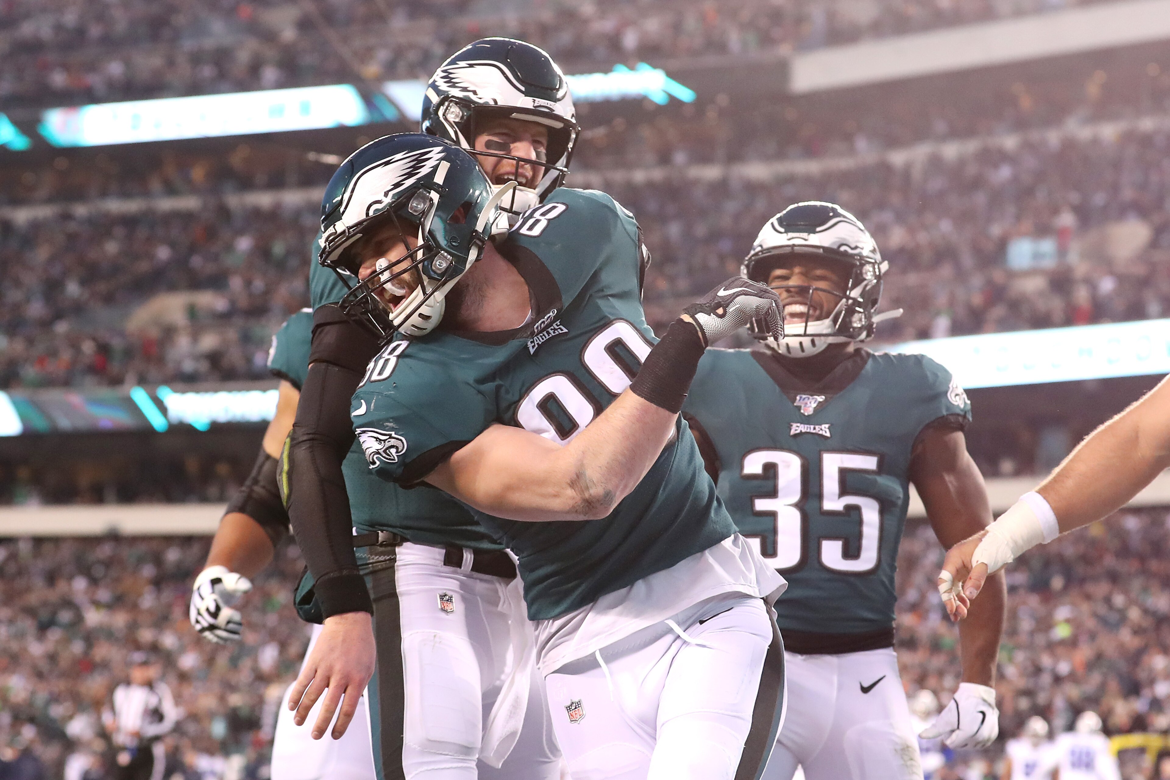 PHILADELPHIA, PENNSYLVANIA - DECEMBER 22: Dallas Goedert #88 of the Philadelphia Eagles celebrates with Carson Wentz #11 after scoring a touchdown during the first quarter against the Dallas Cowboys in the game at Lincoln Financial Field on December 22, 2 PHILADELPHIA, PENNSYLVANIA - DECEMBER 22: Dallas Goedert #88 of the Philadelphia Eagles celebrates with Carson Wentz #11 after scoring a touchdown during the first quarter against the Dallas Cowboys in the game at Lincoln Financial Field on December 22, 2