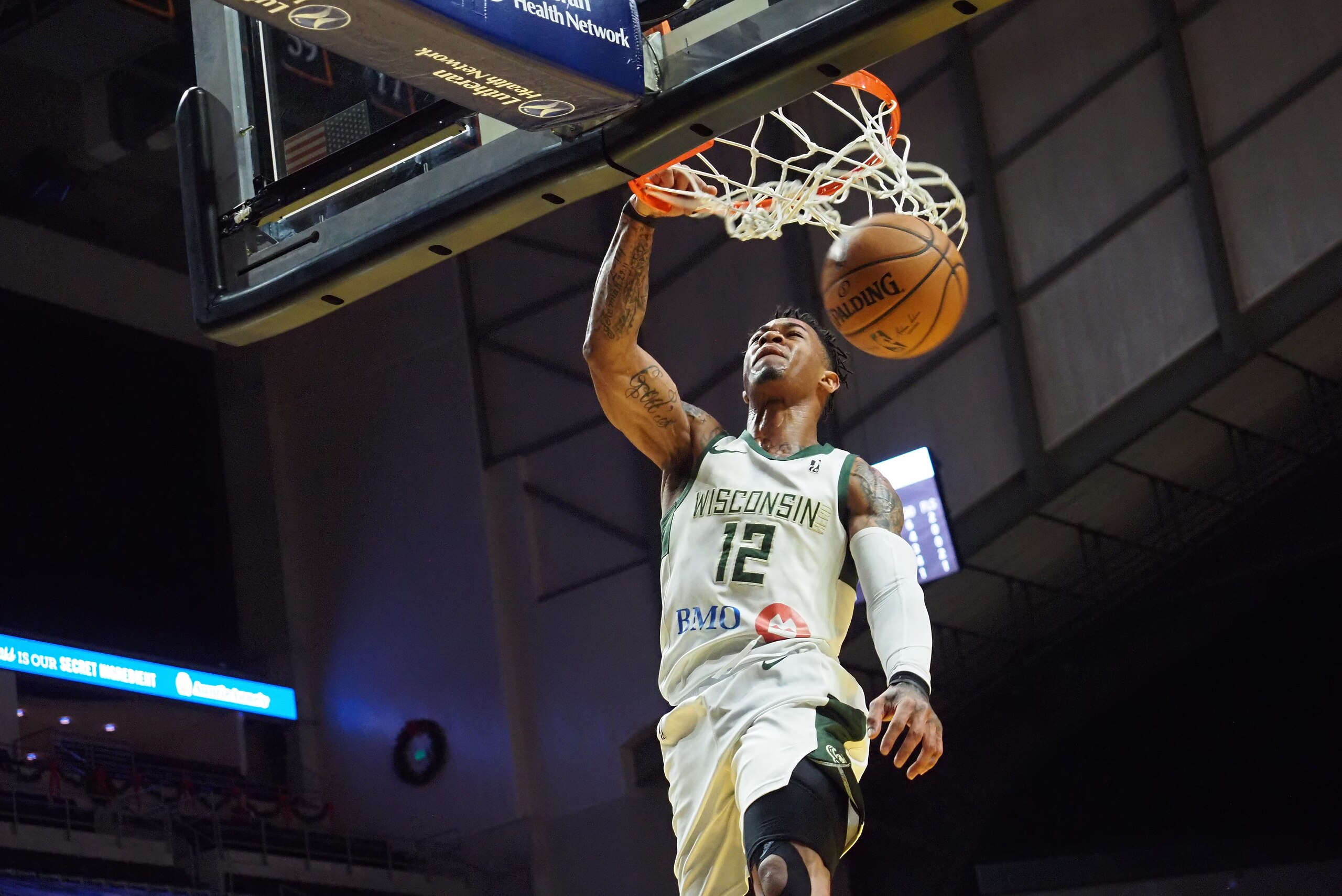 FOT WAYNE, IN  DECEMBER 16: Rayjon Tucker #12 of the Wisconsin Herd dunks the ball against the Fort Wayne Mad Ants on December 16, 2019 at Memorial Coliseum  in Fort Wayne, Indiana. NOTE TO USER: User expressly acknowledges and agrees that, by downloading