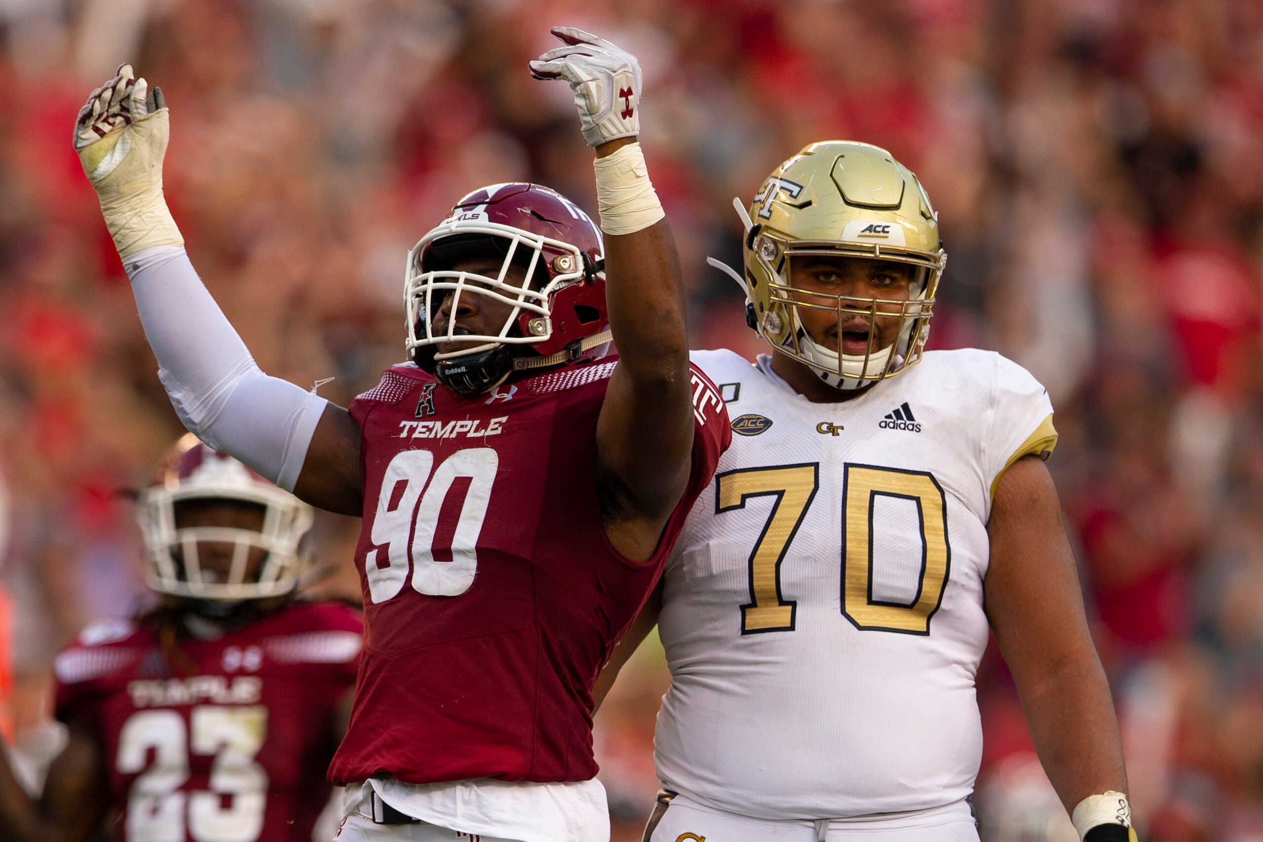 PHILADELPHIA, PA - SEPTEMBER 28: Quincy Roche #90 of the Temple Owls reacts in front of Jared Southers #70 of the Georgia Tech Yellow Jackets at Lincoln Financial Field on September 28, 2019 in Philadelphia, Pennsylvania. The Temple Owls defated the Georg