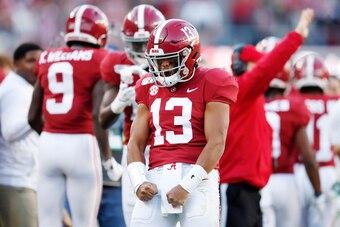 TUSCALOOSA, ALABAMA - NOVEMBER 09: Tua Tagovailoa #13 of the Alabama Crimson Tide celebrates throwing a touchdown pass during the second quarter against the LSU Tigers in the game at Bryant-Denny Stadium on November 09, 2019 in Tuscaloosa, Alabama. (Photo