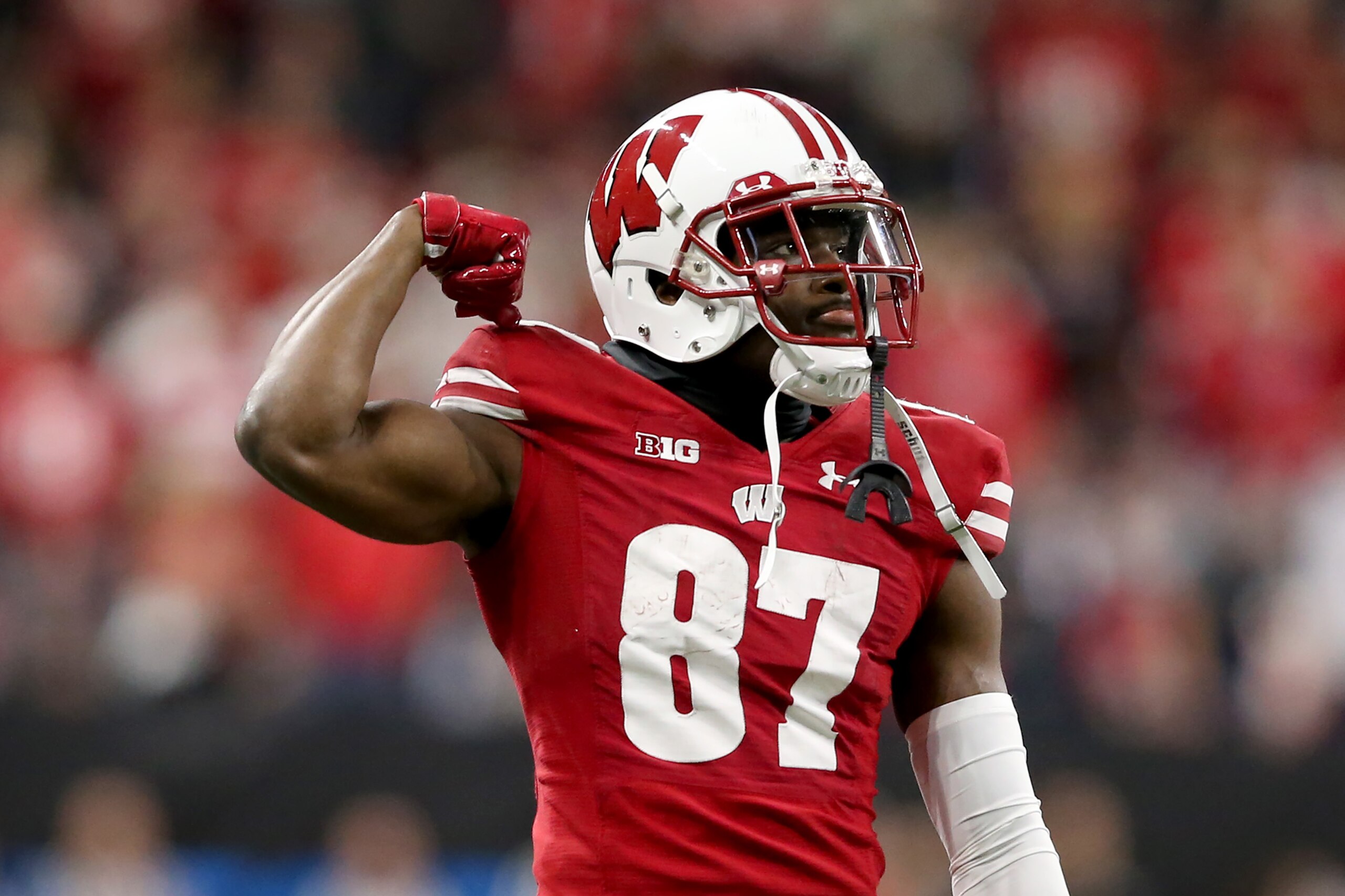 INDIANAPOLIS, INDIANA - DECEMBER 07: Quintez Cephus #87 of the Wisconsin Badgers celebrates after a play in the Big Ten Championship game against the Ohio State Buckeyes at Lucas Oil Stadium on December 07, 2019 in Indianapolis, Indiana. (Photo by Justin 