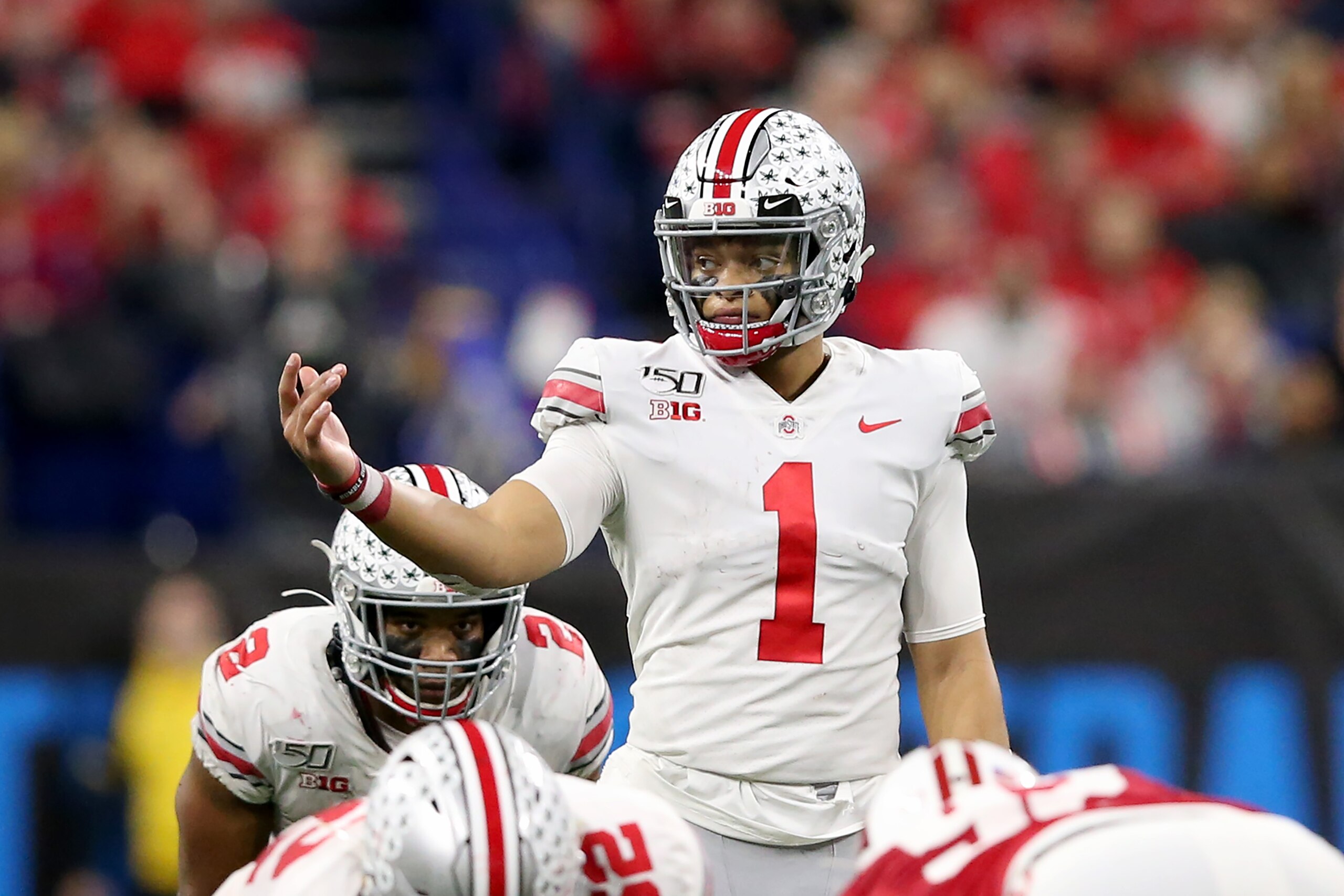 INDIANAPOLIS, INDIANA - DECEMBER 07: Justin Fields #01 of the Ohio State Buckeyes in action in the Big Ten Championship game against the Wisconsin Badgers at Lucas Oil Stadium on December 07, 2019 in Indianapolis, Indiana. (Photo by Justin Casterline/Gett