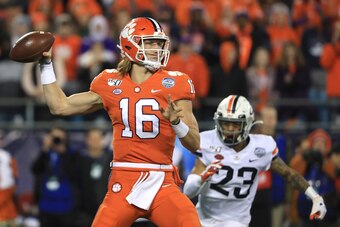 CHARLOTTE, NORTH CAROLINA - DECEMBER 07: Trevor Lawrence #16 of the Clemson Tigers drops back to pass against the Virginia Cavaliers during the ACC Football Championship game at Bank of America Stadium on December 07, 2019 in Charlotte, North Carolina. (P