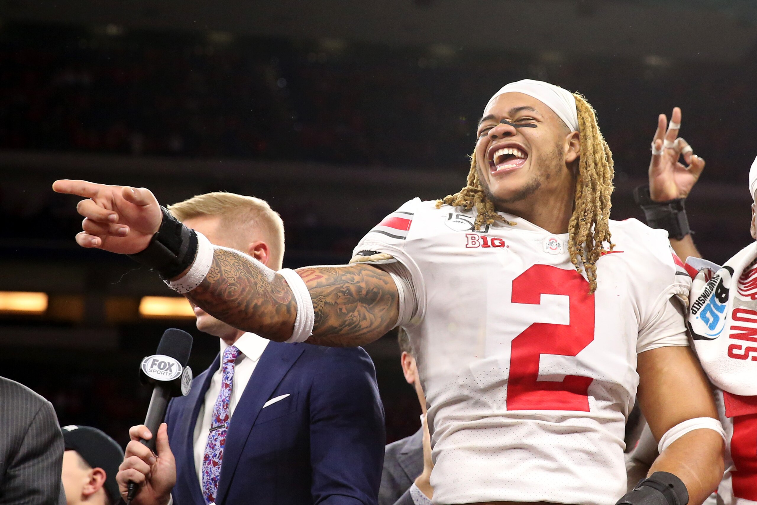 INDIANAPOLIS, INDIANA - DECEMBER 07: Chase Young #02 of the Ohio State Buckeyes on the post game stage after winning the Big Ten Championship game over the Wisconsin Badgers at Lucas Oil Stadium on December 07, 2019 in Indianapolis, Indiana. (Photo by Jus