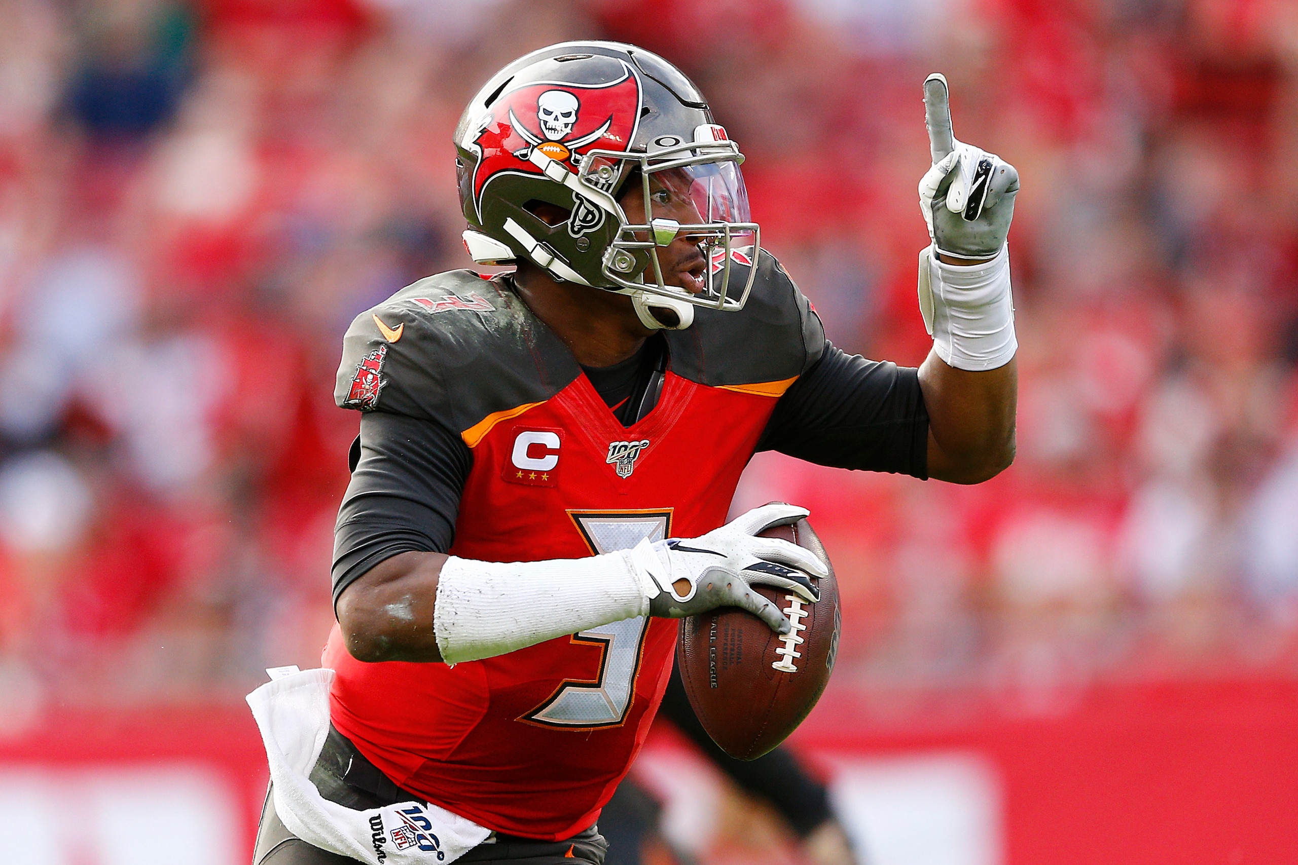TAMPA, FLORIDA - DECEMBER 29:  Jameis Winston #3 of the Tampa Bay Buccaneers scrambles with the ball against the Atlanta Falcons during the second half at Raymond James Stadium on December 29, 2019 in Tampa, Florida. (Photo by Michael Reaves/Getty Images)