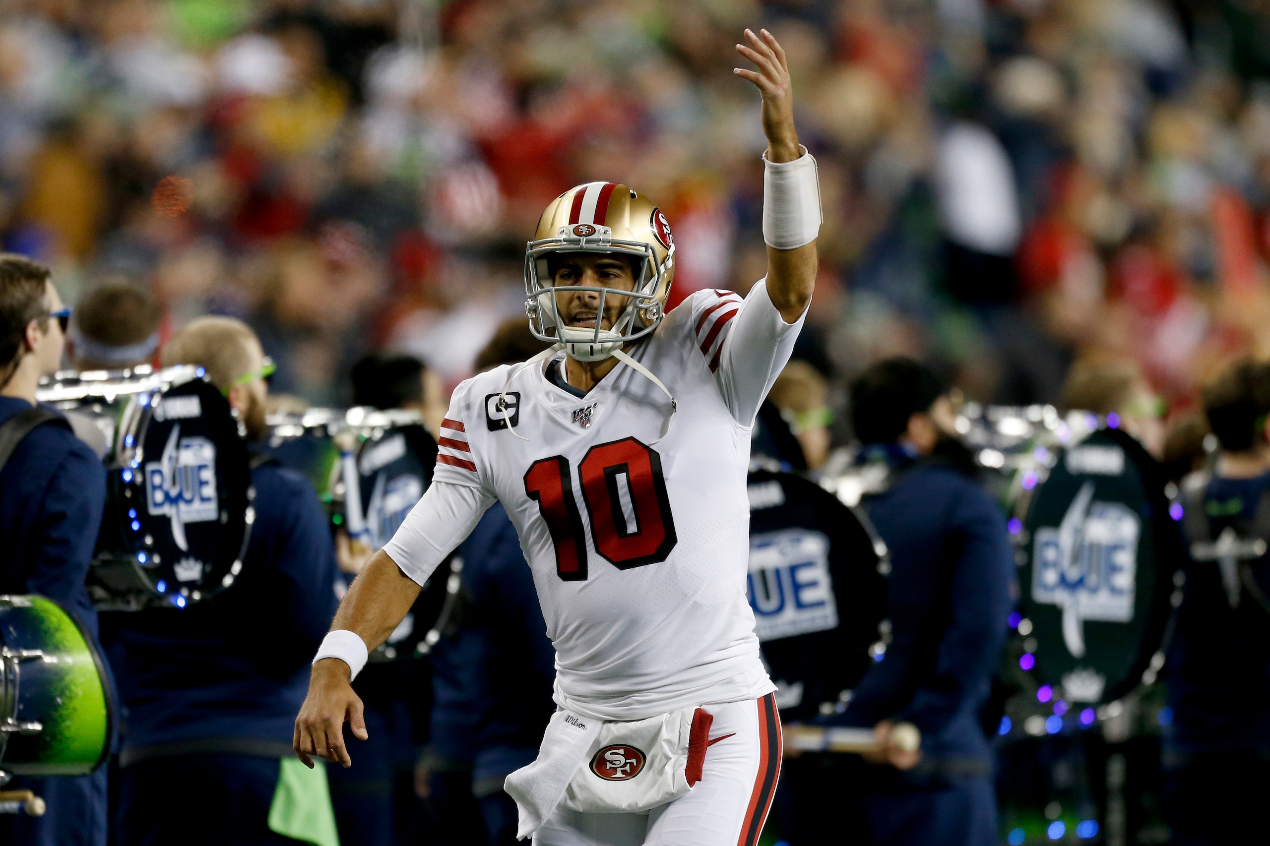 SEATTLE, WASHINGTON - DECEMBER 29: Quarterback Jimmy Garoppolo #10 of the San Francisco 49ers reacts as they take on the Seattle Seahawks during the first quarter of the game at CenturyLink Field on December 29, 2019 in Seattle, Washington. (Photo by Otto SEATTLE, WASHINGTON - DECEMBER 29: Quarterback Jimmy Garoppolo #10 of the San Francisco 49ers reacts as they take on the Seattle Seahawks during the first quarter of the game at CenturyLink Field on December 29, 2019 in Seattle, Washington. (Photo by Otto