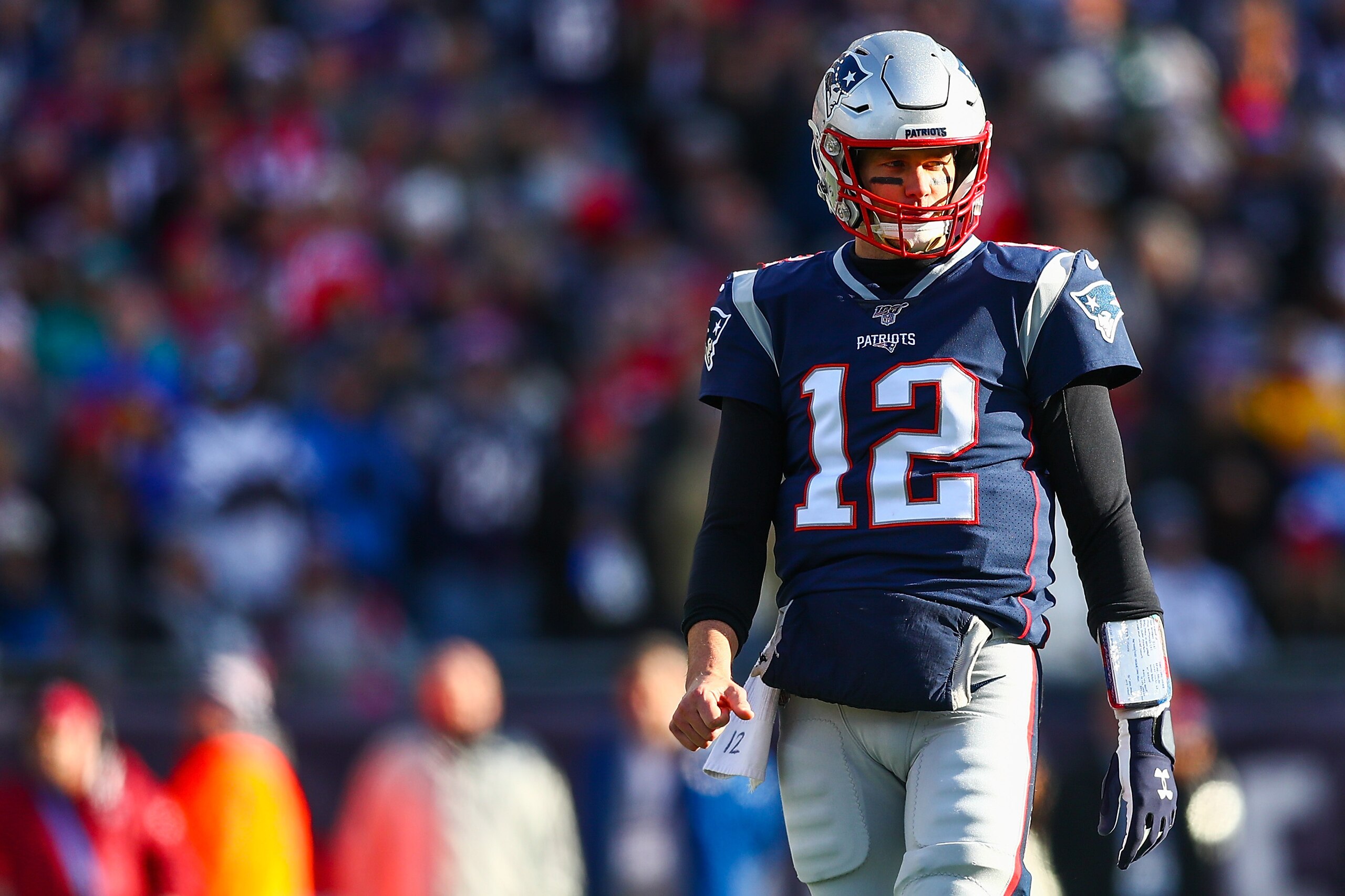 FOXBOROUGH, MA - DECEMBER 29: Tom Brady #12 of the New England Patriots look on during a game against the Miami Dolphins at Gillette Stadium on December 29, 2019 in Foxborough, Massachusetts. (Photo by Adam Glanzman/Getty Images) FOXBOROUGH, MA - DECEMBER 29: Tom Brady #12 of the New England Patriots look on during a game against the Miami Dolphins at Gillette Stadium on December 29, 2019 in Foxborough, Massachusetts. (Photo by Adam Glanzman/Getty Images)