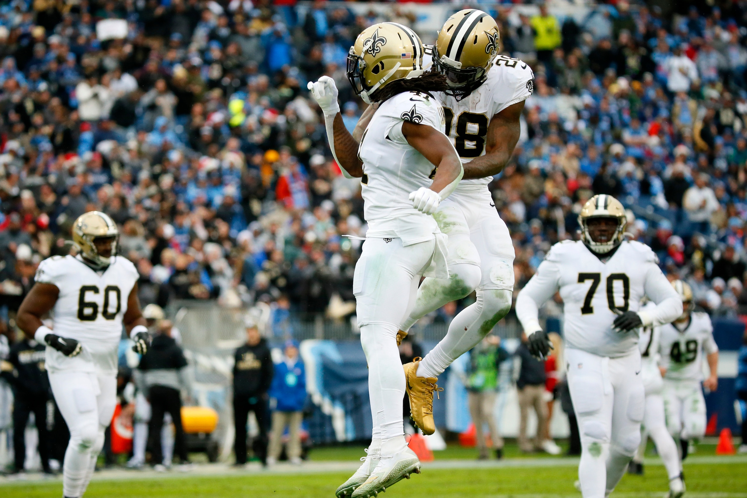 NASHVILLE, TENNESSEE - DECEMBER 22: Running back Alvin Kamara #41 of the New Orleans Saints and running back Latavius Murray #28 of the New Orleans Saints celebrate after a touchdown during the third quarter against Tennessee Titans in the game at Nissan NASHVILLE, TENNESSEE - DECEMBER 22: Running back Alvin Kamara #41 of the New Orleans Saints and running back Latavius Murray #28 of the New Orleans Saints celebrate after a touchdown during the third quarter against Tennessee Titans in the game at Nissan
