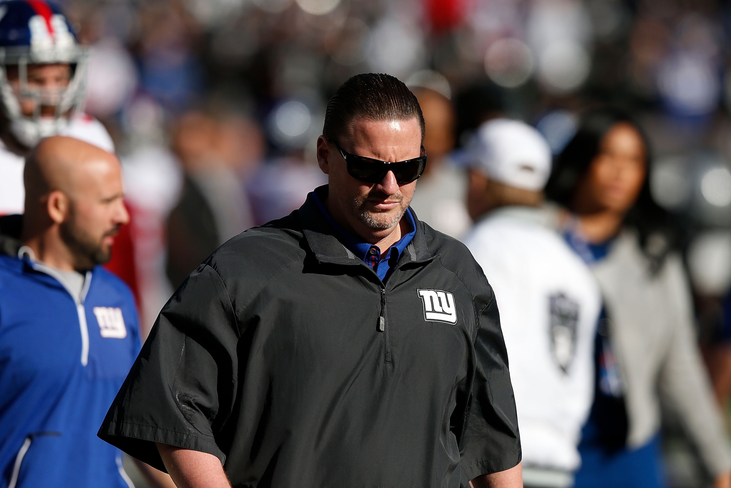 OAKLAND, CA - DECEMBER 03: New York Giants head coach Ben McAdoo leaves the field after the Warm up before their game against the Oakland Raiders at Oakland-Alameda County Coliseum on December 3, 2017 in Oakland, California. (Photo by Lachlan Cunningham/G
