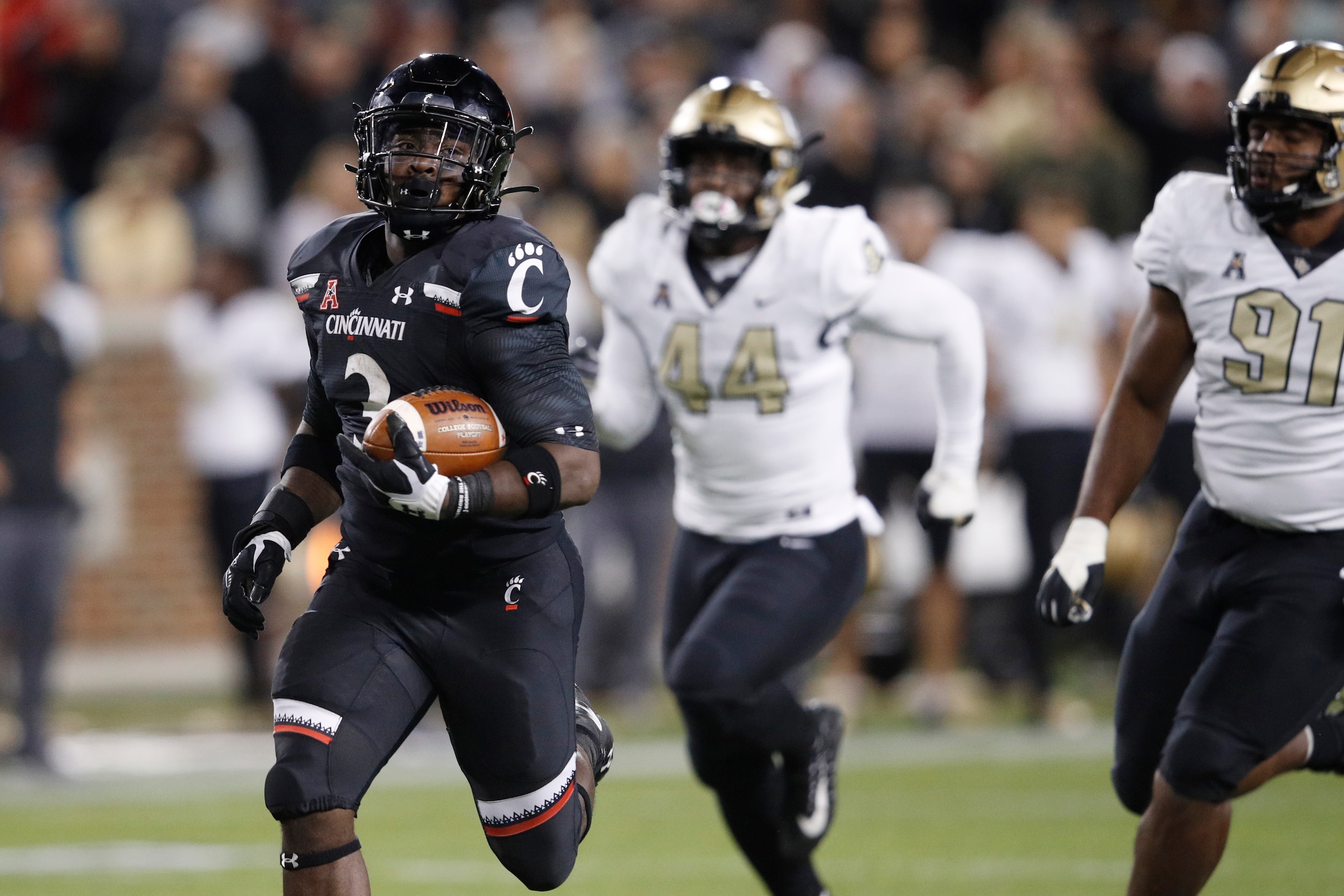 CINCINNATI, OH - OCTOBER 04: Michael Warren II #3 of the Cincinnati Bearcats runs with the ball during the game against the Central Florida Knights at Nippert Stadium on October 4, 2019 in Cincinnati, Ohio. Cincinnati defeated Central Florida 27-24. (Phot