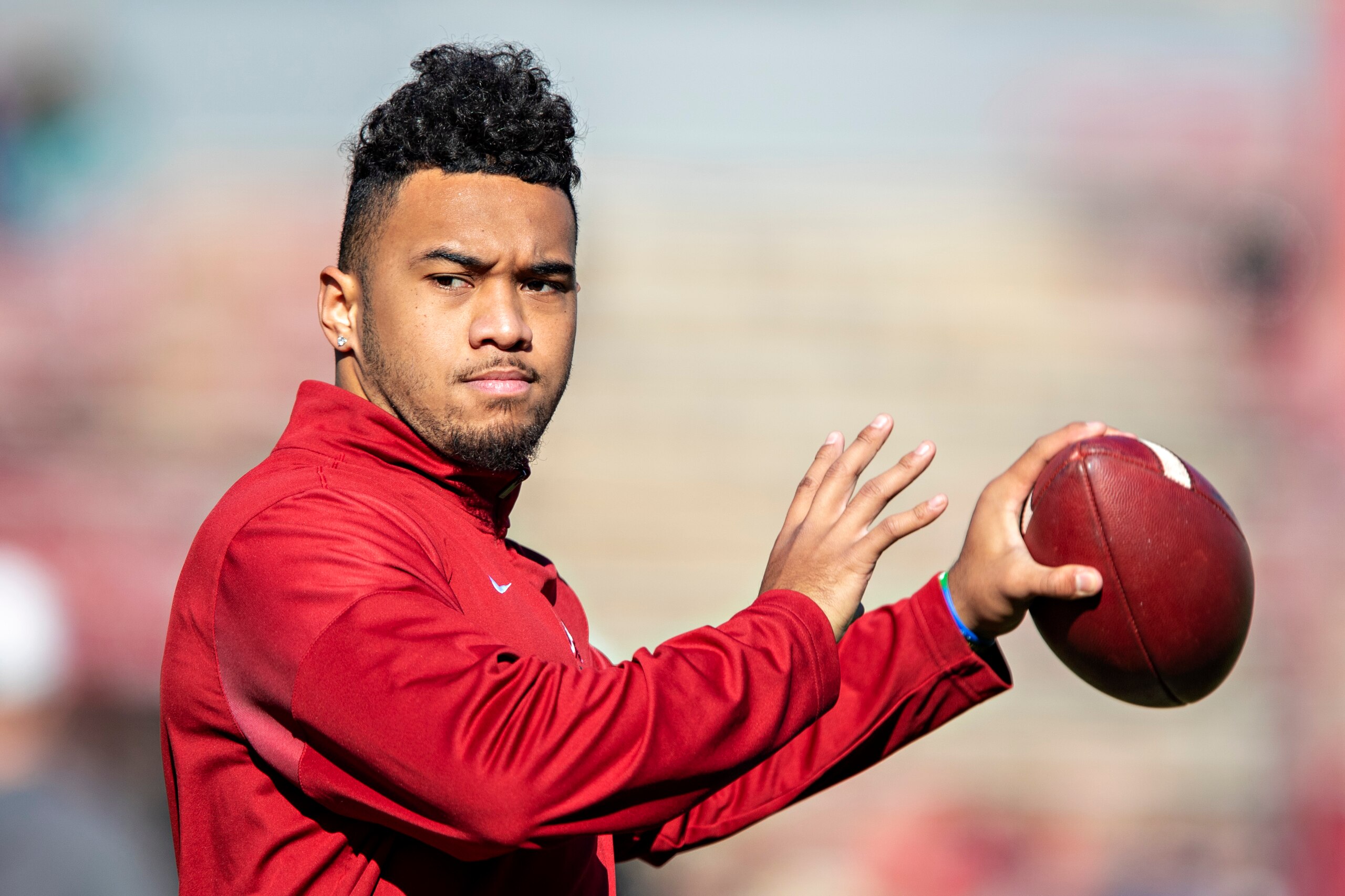 FAYETTEVILLE, AR - NOVEMBER 9:   Tua Tagovailoa #13 of the Alabama Crimson Tide warms up before a game against the Mississippi State Bulldogs at Davis Wade Stadium on November 16, 2019 in Starkville, Mississippi.  The Crimson Tide defeated the Bulldogs 38