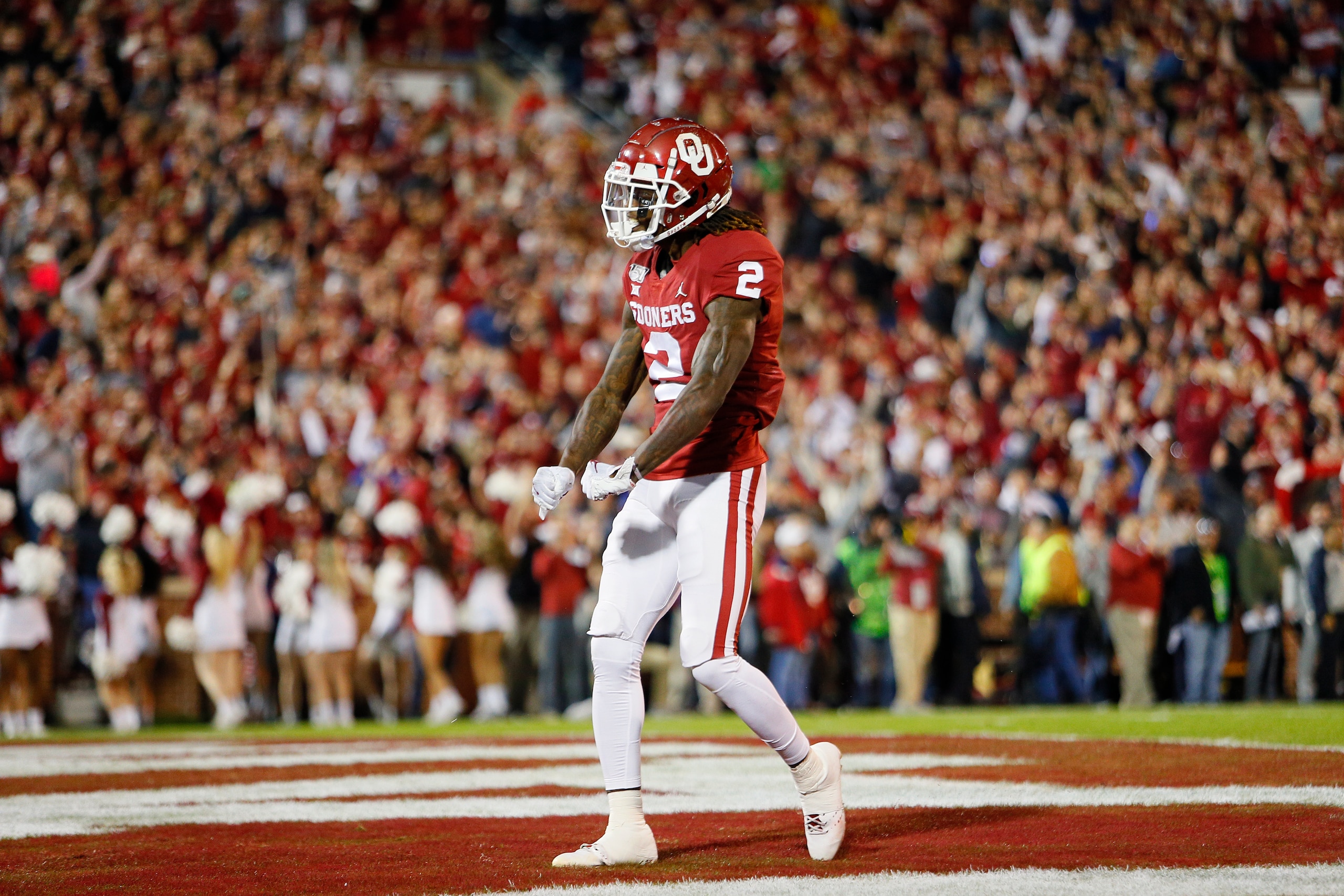 NORMAN, OK - NOVEMBER 9:  Wide receiver CeeDee Lamb #2 of the Oklahoma Sooners celebrates his touchdown catch against the Iowa State Cyclones in the first quarter on November 9, 2019 at Gaylord Family Oklahoma Memorial Stadium in Norman, Oklahoma.  OU hel