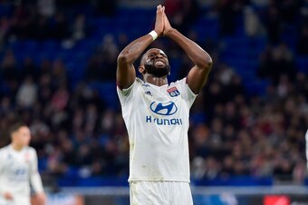 Lyon's Spanish forward Moussa Dembele reacts during the French L1 football match between Olympique Lyonnais and Stade Rennais Football Club at the Groupama stadium in Decines-Charpieu near Lyon, central eastern France on December 15, 2019. (Photo by ROMAI