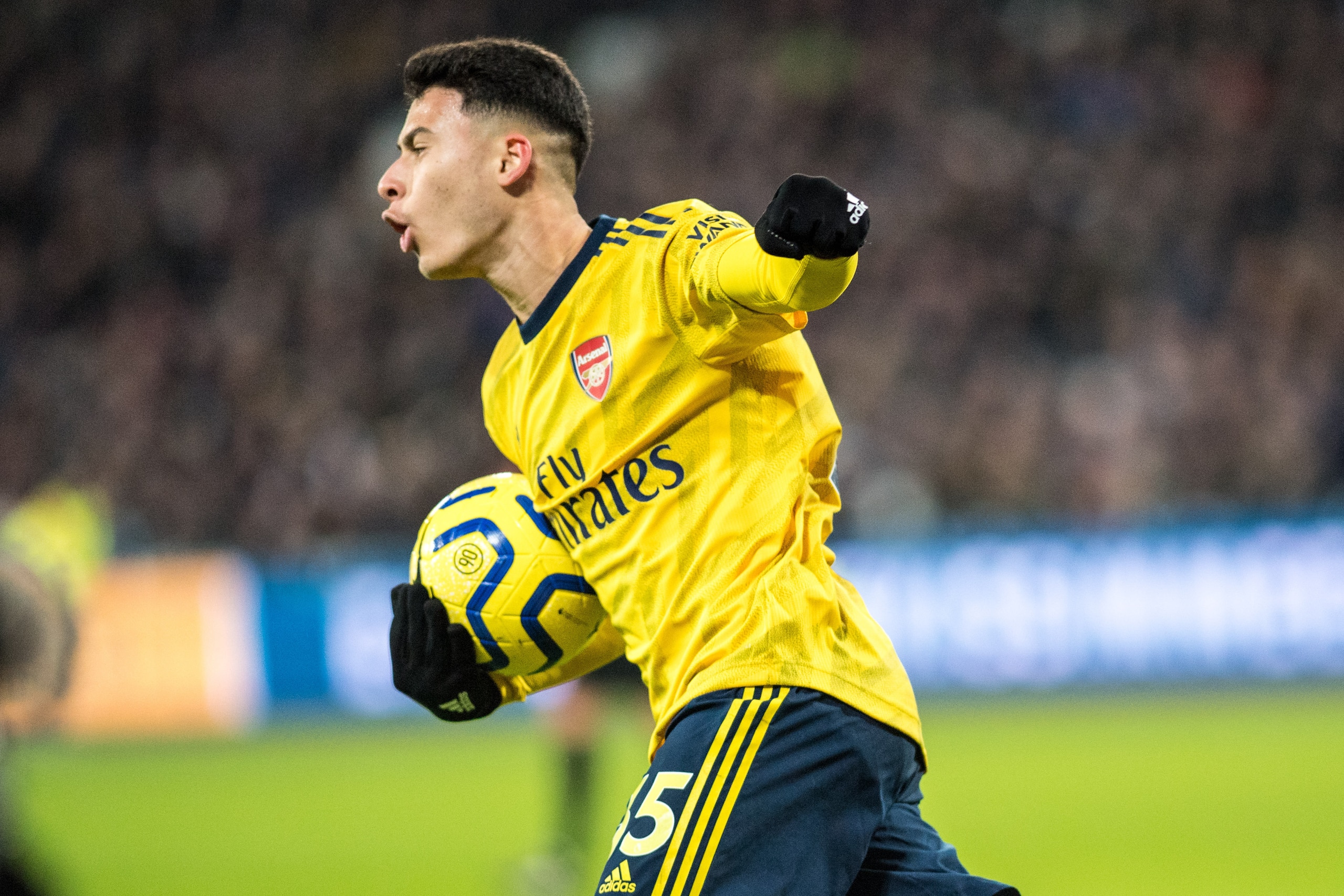 LONDON, ENGLAND - DECEMBER 09: Gabriel Martinelli of Arsenal FC celebrates after scoring a goal during the Premier League match between West Ham United and Arsenal FC at London Stadium on December 9, 2019 in London, United Kingdom. (Photo by Sebastian Fre