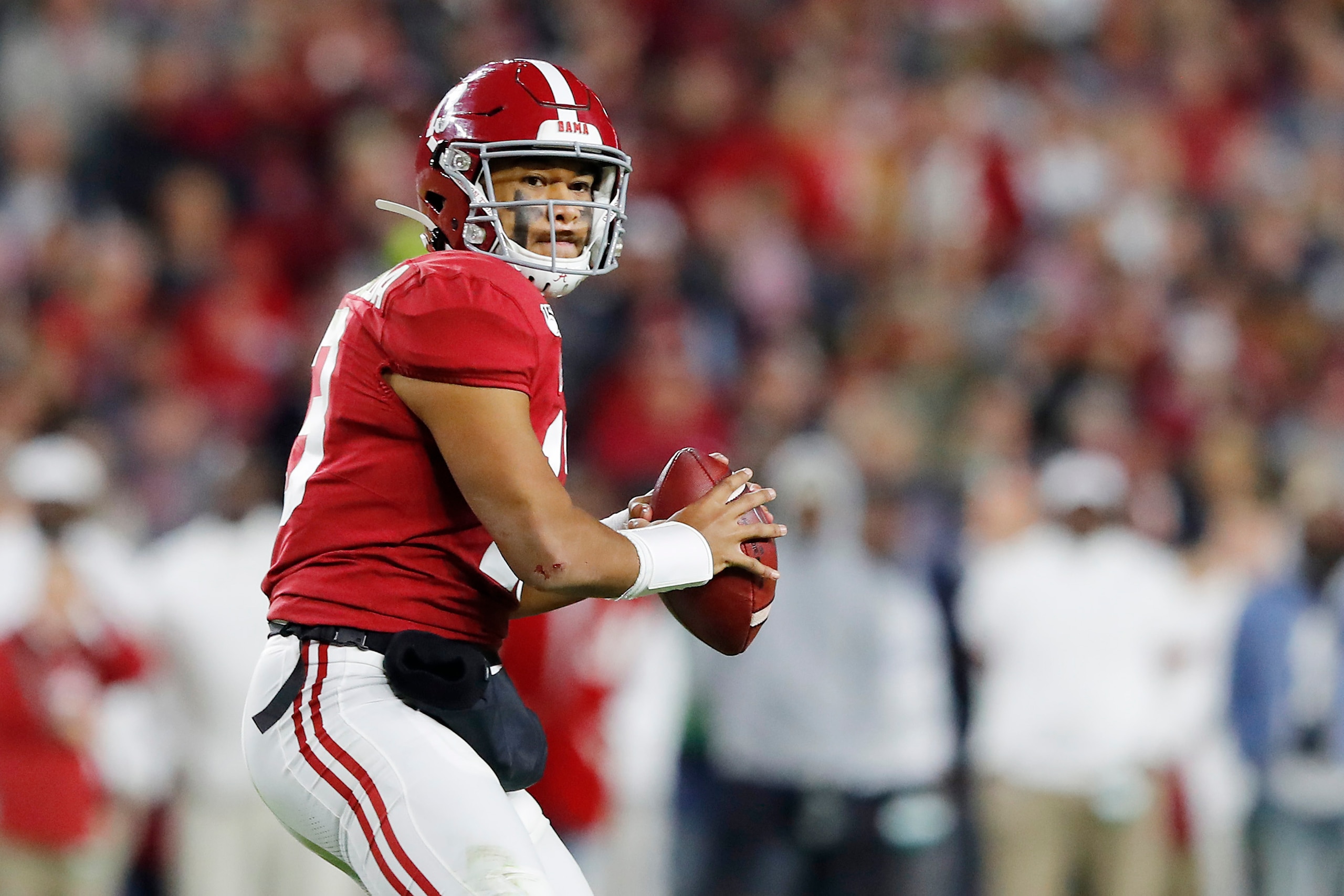 TUSCALOOSA, ALABAMA - NOVEMBER 09: Tua Tagovailoa #13 of the Alabama Crimson Tide looks to pass during the second half against the LSU Tigers in the game at Bryant-Denny Stadium on November 09, 2019 in Tuscaloosa, Alabama. (Photo by Kevin C. Cox/Getty Ima
