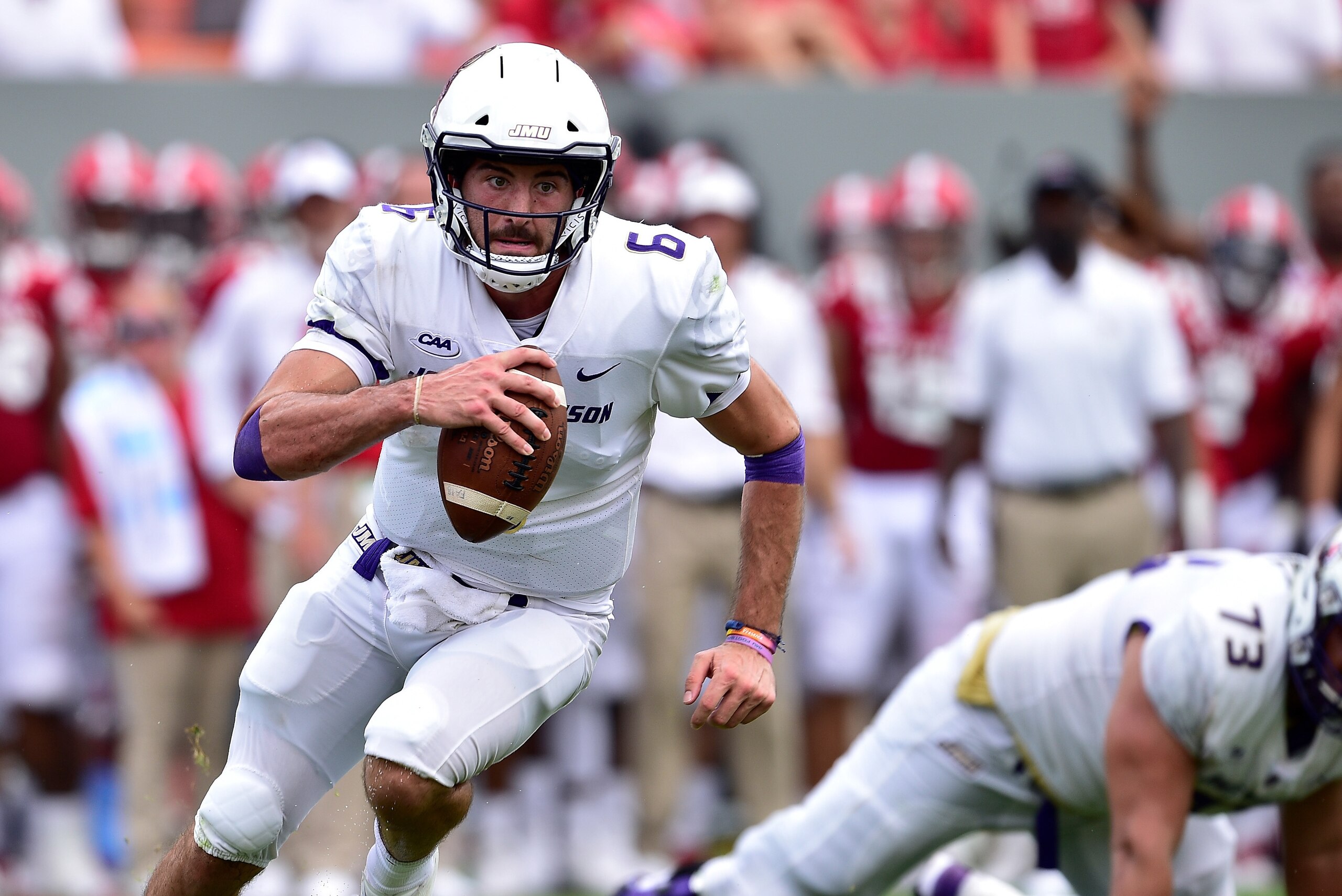 RALEIGH, NC - SEPTEMBER 01:  Ben DiNucci #6 of the James Madison Dukes during their game against the North Carolina State Wolfpack at Carter-Finley Stadium on September 1, 2018 in Raleigh, North Carolina. North Carolina State won 24-13.  (Photo by Grant H